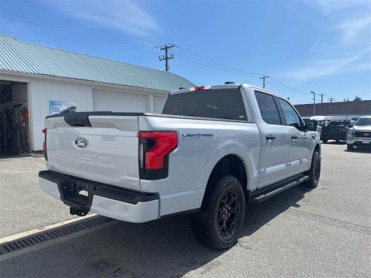 2025 Ford F-150 Lightning XLT  - Tailgate Step Photo4
