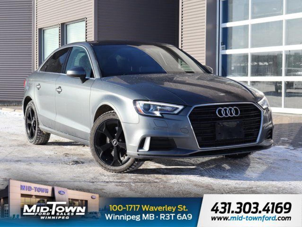 Recent Arrival!<br /><br />| One Owner, | Local Trade, | Clean Carfax, | Non Smoker, quattro, Leather, 10 Speakers, 4-Wheel Disc Brakes, ABS brakes, Air Conditioning, Alloy wheels, AM/FM radio: SiriusXM, Anti-whiplash front head restraints, Auto-dimming Rear-View mirror, Automatic temperature control, Brake assist, Bumpers: body-colour, CD player, Compass, Delay-off headlights, Driver door bin, Driver vanity mirror, Dual front impact airbags, Dual front side impact airbags, Electronic Stability Control, Exterior Parking Camera Rear, Four wheel independent suspension, Front anti-roll bar, Front Bucket Seats, Front dual zone A/C, Front reading lights, Heated door mirrors, Heated Front Bucket Seats, Heated front seats, High intensity discharge headlights: Xenon plus, Illuminated entry, Knee airbag, Leather Seating Surfaces, Leather Shift Knob, Leather steering wheel, Navigation System, Occupant sensing airbag, Outside temperature display, Overhead airbag, Panic alarm, Passenger door bin, Passenger vanity mirror, Power door mirrors, Power driver seat, Power moonroof, Power passenger seat, Power steering, Power windows, Radio data system, Radio: MMI w/7 Colour Display, Rain sensing wipers, Rear anti-roll bar, Rear fog lights, Rear reading lights, Rear window defroster, Remote keyless entry, Security system, Speed control, Speed-sensing steering, Speed-Sensitive Wipers, Split folding rear seat, Steering wheel mounted audio controls, Tachometer, Telescoping steering wheel, Tilt steering wheel, Traction control, Trip computer, Turn signal indicator mirrors, Variably intermittent wipers, Wheels: 8J x 18 5-Twin-Spoke Partly Polished.<br /><br />Gray 2018 Audi A3 2.0T Progressiv quattro quattro 2.0L 4-Cylinder TFSI 6-Speed Automatic<br /><br /><br />For further information please contact MidTown Ford sales department directly at 204-284-7650. Dealer #9695.<br /><br /><br />Awards:<br />* JD Power Canada Automotive Performance, Execution and Layout (APEAL) Study