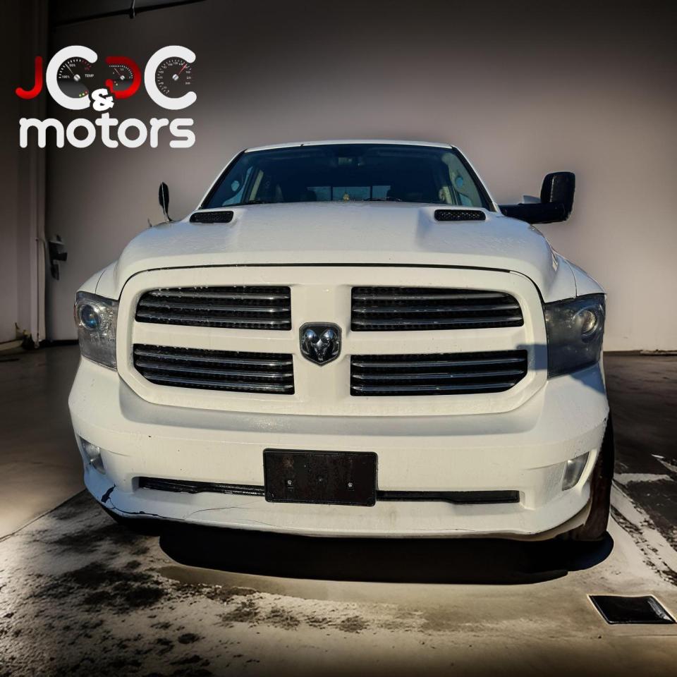 2014 RAM 1500 4WD CREW CAB 149" SPORT - Photo #2