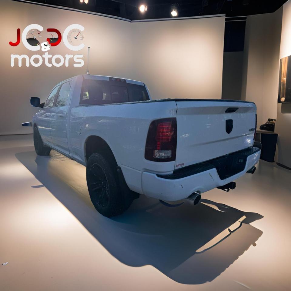 2014 RAM 1500 4WD CREW CAB 149" SPORT - Photo #5