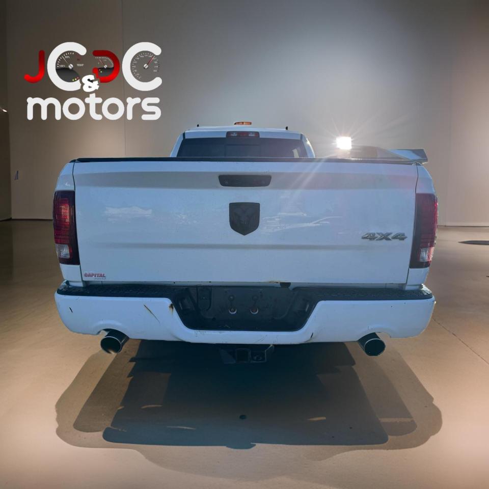 2014 RAM 1500 4WD CREW CAB 149" SPORT - Photo #6