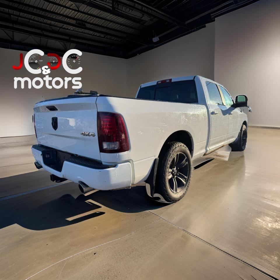 2014 RAM 1500 4WD CREW CAB 149" SPORT - Photo #7