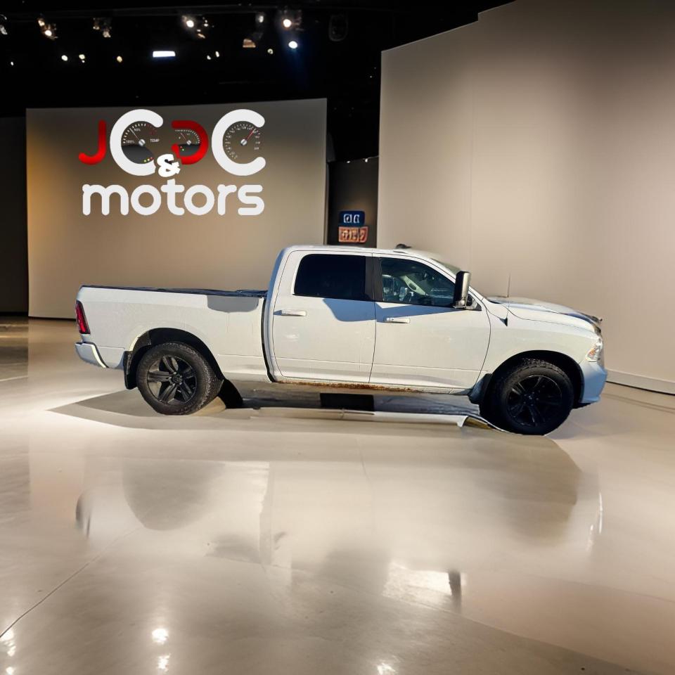 2014 RAM 1500 4WD CREW CAB 149" SPORT - Photo #8