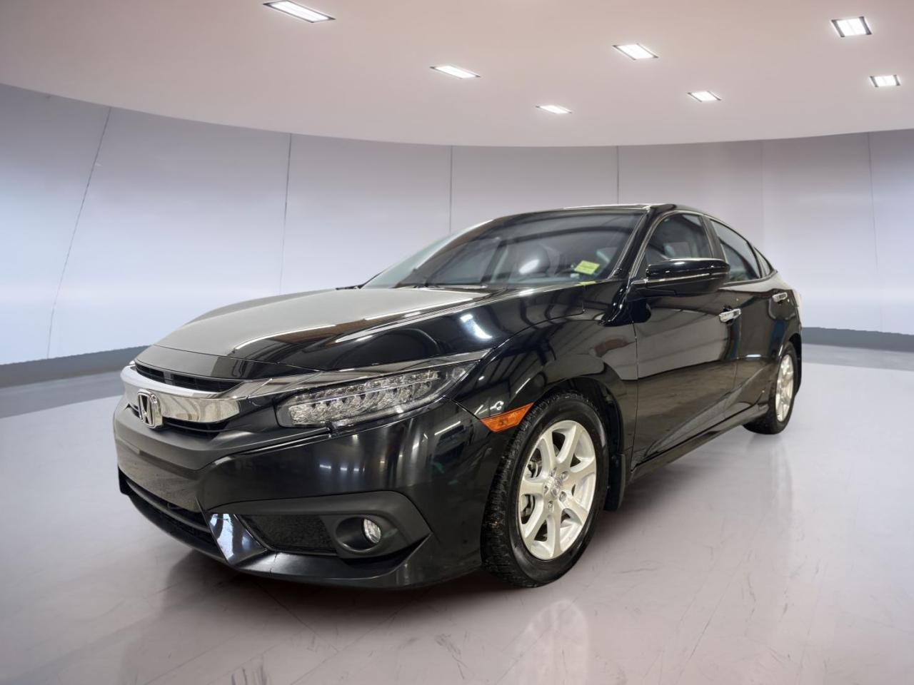 <p> this vehicle is ready to offer many more miles of driving pleasure.

FEATURES OF THE Civic Sedan Touring
»» Turbocharged 1.5L I-4 DOHC engine
»» Continuously Variable Transmission for smooth rides
»» Front-wheel drive for enhanced control
»» Low mileage at just 28</p>
<p>323 km

ADVANCED SAFETY FEATURES
»» Lane departure warning system
»» Adaptive cruise control for safe distances
»» Collision mitigation braking system
»» Multi-angle rearview camera

PERFORMANCE AND EFFICIENCY
»» Turbocharged engine for spirited driving
»» Excellent fuel efficiency with CVT
»» Front-wheel drive for optimal traction
»» Responsive handling for city and highway

COMFORT AND CONVENIENCE
»» Dual-zone automatic climate control
»» Heated front and rear seats
»» Power-adjustable drivers seat
»» Spacious cabin for all passengers

TECHNOLOGY AND CONNECTIVITY
»» HondaLink infotainment system
»» Integrated navigation system
»» Bluetooth hands-free connectivity
»» Premium audio system for rich sound

CARGO SPACE
»» Generous trunk space for luggage
»» 60/40 split-folding rear seats
»» Ample storage compartments
»» Easy access with wide trunk opening

WHAT OTHER OWNERS LIKE
»» Smooth and efficient turbocharged engine
»» Advanced safety features for peace of mind
»» Comfortable and spacious interior
»» Intuitive technology and connectivity options

This 2016 Honda Civic Sedan Tourings VIN is: 2HGFC1F9XGH108856.</p>
<a href=http://www.moosejawhonda.ca/used/Honda-Civic_Sedan-2016-id11930309.html>http://www.moosejawhonda.ca/used/Honda-Civic_Sedan-2016-id11930309.html</a>