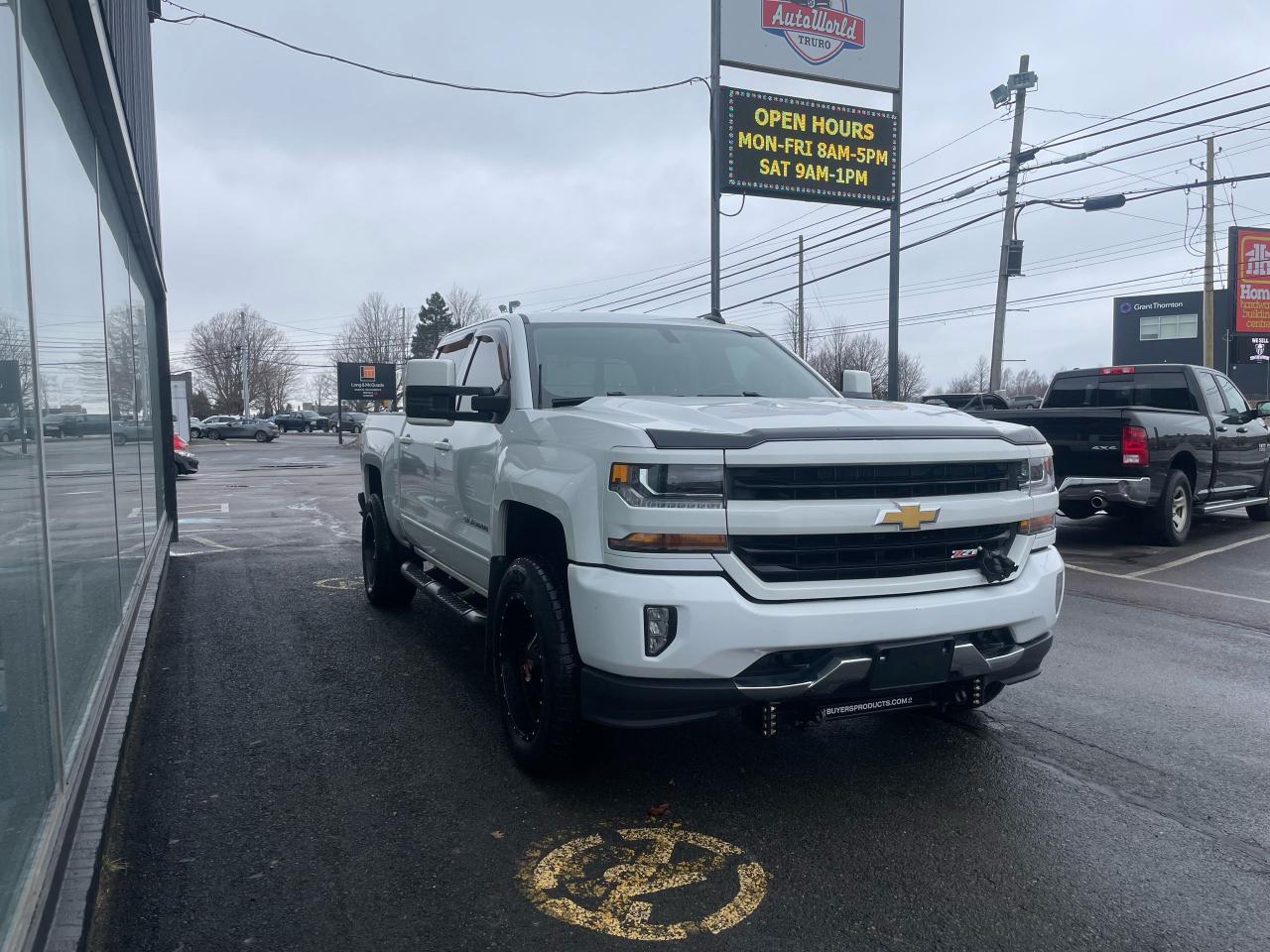 <div>A real head turner with lots of tasteful upgrades such as a 2.5 lift, aftermarket wheels, LEDs, tow mirrors, an upgraded backup camera and so much more. This truck wont last long. </div>