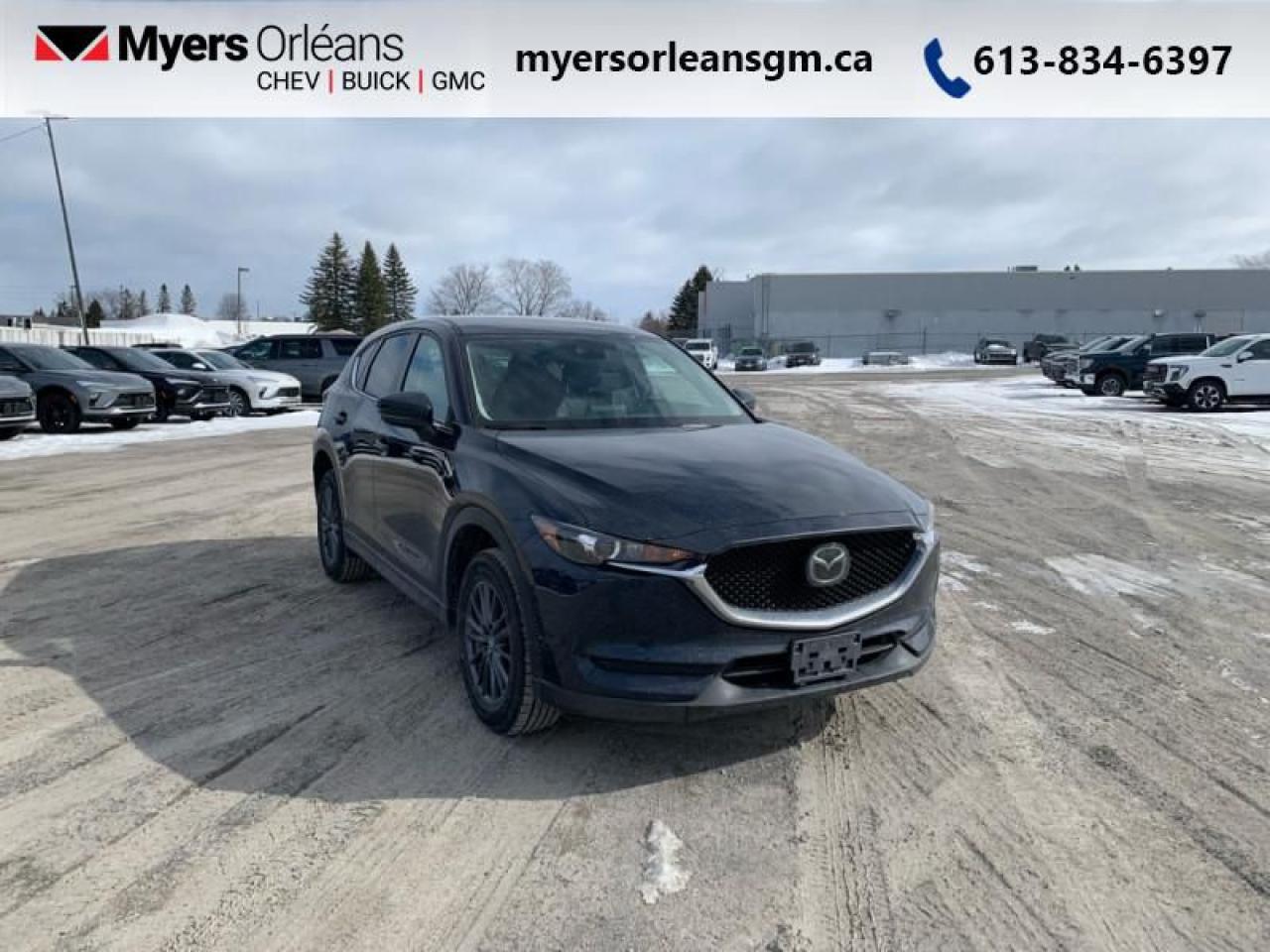 <b>Low Mileage, Power Liftgate,  Heated Seats,  Heated Steering Wheel,  Apple CarPlay,  Android Auto!</b><br> <br>    The 2019 Mazda CX-5s athletic handling, precise steering, and upscale cabin are just some of the reasons why it ranks near the top of the compact SUV class. This  2019 Mazda CX-5 is fresh on our lot in Orleans. <br> <br>This Mazda CX5 is a real class leader with exceptional performance, agile handling and a versatile and highly intuitive interior. Thanks to its elegant yet aggressive styling and impeccable on road capabilities, there arent many that can rival the quality and premium performance this modern, beautiful crossover SUV offers. This low mileage  SUV has just 60,114 kms. Its  blue in colour  . It has an automatic transmission and is powered by a  187HP 2.5L 4 Cylinder Engine.  It may have some remaining factory warranty, please check with dealer for details. <br> <br> Our CX-5s trim level is GS. Stepping up to this CX-5 GS is a great choice as you will get a power liftgate, heated steering wheels, stylish aluminum wheels, advanced blind spot monitoring, heated seats on synthetic leather upholstery and a large touch screen display with MAZDA CONNECT, Apple CarPlay and Android Auto.Additional luxurious features includes a LED lighting, a multifunction steering wheel with built in Mazda radar cruise control, lane departure warning and lane keep assist, automatic high beam assist, a wide angle rearview camera, rear collision warning and a proximity key for push button start. This vehicle has been upgraded with the following features: Power Liftgate,  Heated Seats,  Heated Steering Wheel,  Apple Carplay,  Android Auto,  Aluminum Wheels,  Proximity Key. <br> <br>To apply right now for financing use this link : <a href=https://www.myersorleansgm.ca/FinancePreQualForm target=_blank>https://www.myersorleansgm.ca/FinancePreQualForm</a><br><br> <br/><br> Buy this vehicle now for the lowest bi-weekly payment of <b>$212.14</b> with $0 down for 84 months @ 9.99% APR O.A.C. ( Plus applicable taxes -  Plus applicable fees   ).  See dealer for details. <br> <br>*MYERS LIFETIME ENGINE AND TRANSMISSION COVERAGE CERTIFICATE NOT AVAILABLE ON VEHICLES WITH KMS EXCEEDING 140,000KM, VEHICLES 8 YEARS & OLDER, OR HIGHLINE BRAND VEHICLE(eg. BMW, INFINITI. CADILLAC, LEXUS...)<br> Come by and check out our fleet of 50+ used cars and trucks and 140+ new cars and trucks for sale in Orleans.  o~o