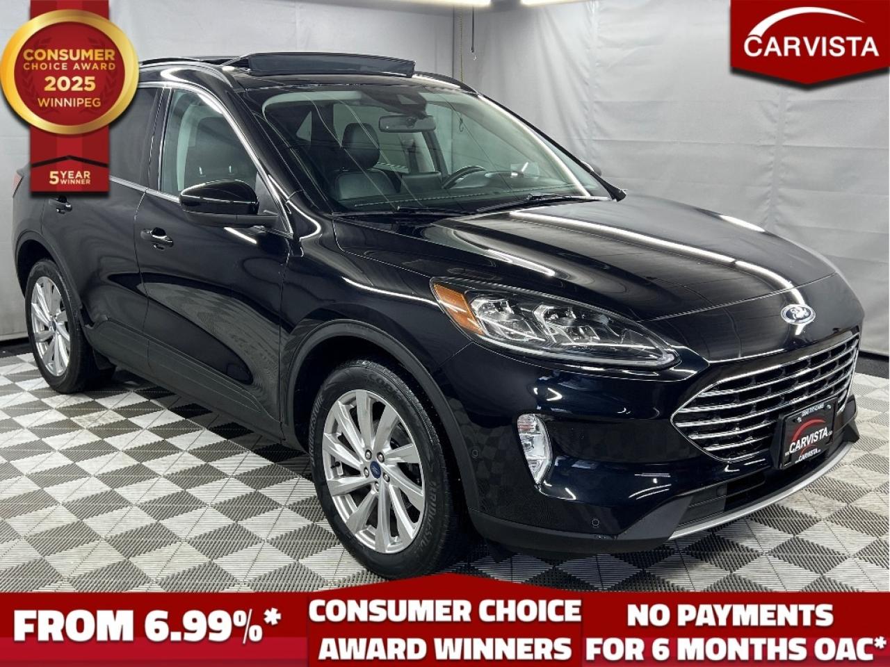 CONSECUTIVE COMSUMER CHOICE AWARD WINNERS FOR OUTSTANDING BUSINESS! LOW DEALER FINANCING RATES*, NO PAYMENTS FOR 6 MONTHS*!   

LEATHER HEATED SEATS/STEERING WHEEL, NAVIGATION, REVERSE CAMERA, HEADS UP DISPLAY, BLUETOOTH HANDSFREE, BLINDSPOT MONITORING, LANE ASSIST, POWER LIFTGATE, REMOTE START, KEYLESS ENTRY, NO ACCIDENTS, 1 OWNER

Factory powertrain warranty until April 28, 2026 or 100,000KM

2021 Ford Escape Titanium, a top of the line compact SUV that combines premium comfort, smart technology, and outstanding fuel efficiency. This particular vehicle has had just one owner since new and has never been involved in an accident, with a clean history that reflects careful ownership and regular maintenance. The Escape Titanium stands out for its refined driving experience and upscale features, making it an excellent choice for commuters, families, or anyone who values both practicality and comfort in an SUV.

Powered by a responsive yet fuel efficient 2.0L Turbo charged 4 cylinder engine, this Escape delivers impressive gas mileage without sacrificing performance. The Titanium trim level offers a truly elevated driving experience, featuring soft leather trimmed seating, a sleek and intuitive SYNC 3 touchscreen infotainment system with built in navigation, and a crystal clear Bang & Olufsen premium sound system. Other luxury touches include adaptive cruise control, a handsfree power liftgate, remote start, dual zone automatic climate control, and a full suite of Ford Co-Pilot360 safety technologies to help you drive with confidence.

Finished in a stylish and modern exterior color with a tastefully appointed interior, this Escape is as attractive as it is practical. Whether youre navigating city streets or heading out on a weekend road trip, this 2021 Ford Escape Titanium is ready to impress.

5 years running, consecutive receivers of the prestigious Consumer Choice Award in 2021, 2022, 2023, 2024 and 2025! Low rate dealer arranged financing available! 
At Carvista we offer a unique buying experience, with no deceiving finance gimmicks and trades are welcome but not required! Carvista is a family operated business that has been in business for over 25 years, and has earned a A+ BBB Accreditation and outstanding consumer accolades Offering 175 quality pre-owned vehicles, all are certified and Carfax verified, most with remaining factory warranty and a modern facility located on Winnipegs Regent Ave strip We welcome you to visit us at 1201 Regent Ave W, at Carvista, and drive away in a like new vehicle for less In many cases we can offer no payments for 6 months! Dont let your trade or credit stop you, we accept any kind, any time CARVISTACA, "Where the deals are"
 Prices and payments exclude GST OR PST Carvista Inc. 
Dealer Permit # 1211, Category: Used Vehicle 
Please verify all ad details with a Carvista sales person, vehicle may not be exactly as shown.