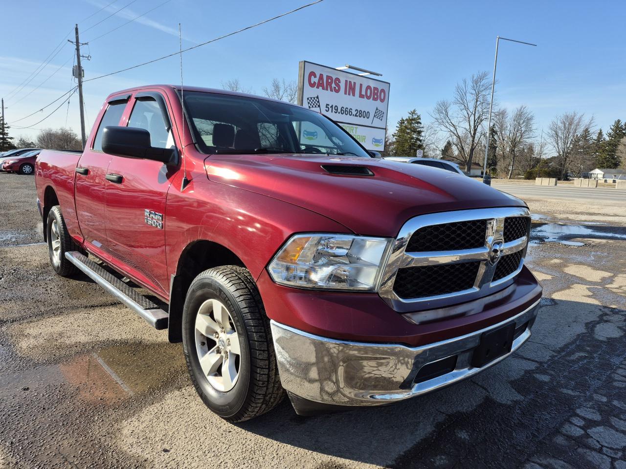 Used 2014 RAM 1500 4WD QUAD CAB 140.5