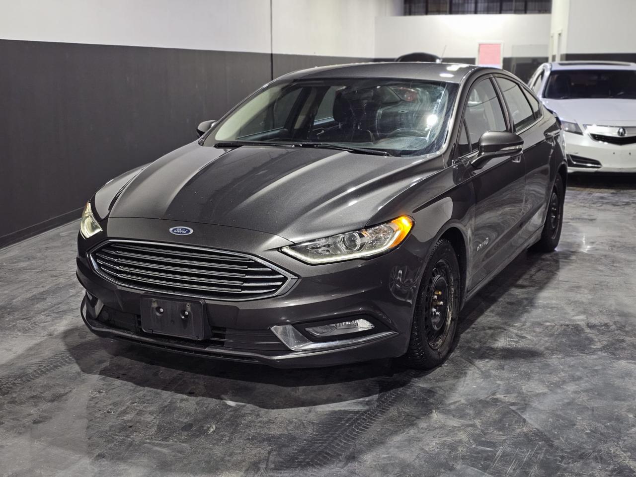 Used 2017 Ford Fusion 4DR SDN SE HYBRID FWD for sale in Mississauga, ON