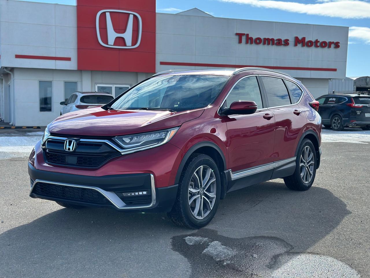 <p>Get ready to experience the ultimate blend of style, comfort, and performance with the 2022 Honda CR-V Touring AWD, now available at Thomas Honda! This sleek and sophisticated SUV is the perfect companion for your everyday adventures, offering a spacious interior, advanced technology, and a smooth and efficient ride.</p><p>Step inside and be greeted by luxurious leather seats, a heated steering wheel, and a premium sound system that will elevate your driving experience. The spacious cabin boasts a wealth of features, including a power liftgate, a navigation system, and a panoramic sunroof, ensuring that every journey is comfortable and enjoyable. The CR-V Touring AWD is packed with advanced safety features, keeping you and your passengers protected on the road.</p><p>Here are 5 of the CR-V Touring AWDs most enticing features:</p><ul><li><strong>Heated Front Seats:</strong> Stay warm and cozy even on the coldest days with the heated front seats.</li><li><strong>Navigation System:</strong> Never get lost again with the integrated navigation system that guides you to your destination with ease.</li><li><strong>Leather Seats:</strong> Experience luxury and comfort with the premium leather seating.</li><li><strong>Power Liftgate:</strong> Effortlessly load and unload your cargo with the convenient power liftgate.</li><li><strong>Heated Steering Wheel:</strong> Enjoy a warm grip on the steering wheel even in frigid temperatures, ensuring a comfortable drive.</li></ul><p>Visit Thomas Honda today to experience the 2022 Honda CR-V Touring AWD for yourself and discover why its the perfect choice for your next adventure.</p><p> </p>