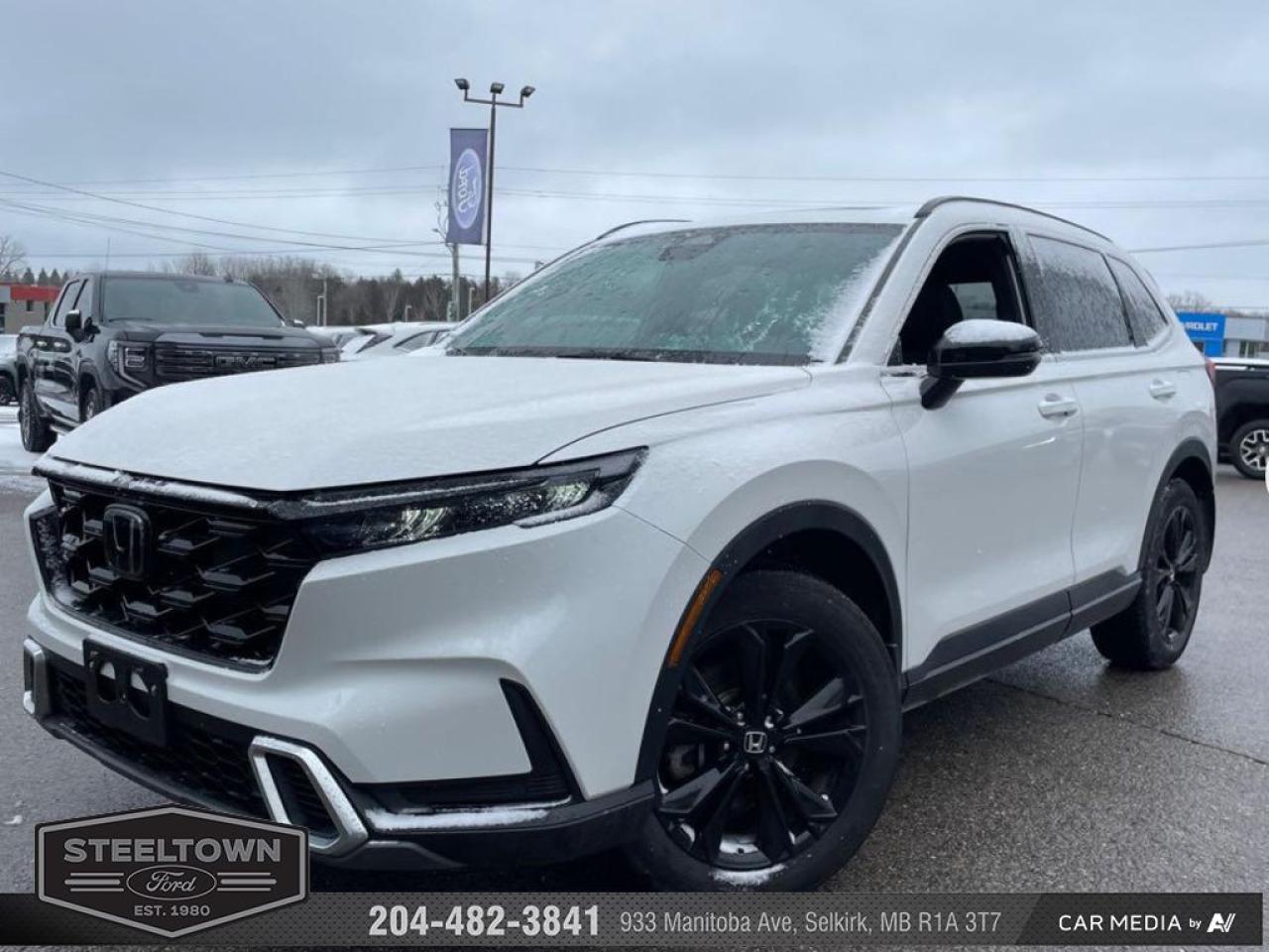 <b>Navigation,  4G Wi-Fi,  Wireless Charging,  Leather Seats,  Sunroof!</b><br> <br> We value your TIME, we wont waste it or your gas is on us!   We offer extended test drives and if you cant make it out to us we will come straight to you!<br><br><br> <br>   An iconic SUV is reborn for 2023, with a slew of impressive technology and an all-new design! This  2023 Honda CR-V Hybrid is for sale today in Selkirk. <br> <br>A legend returns! For 2023, Honda completely revised the ubiquitous CR-V, with a host of performance, design and technological upgrades to give it an even bigger edge against rivals in the ever-heated crossover SUV segment. With roomy seating, wide-open sightlines, and sporty details throughout, the all-new interior of the 2023 CR-V makes it easy to settle in and enjoy the ride. Upgraded infotainment systems with even more active and passive safety systems ensure a serene and uncompromised ride in this SUV.This  SUV has 42,814 kms. Its  white in colour  and is completely accident free based on the <a href=https://vhr.carfax.ca/?id=3msXXqSOpJ8OZHggDzckgAtkyFn6MsMi target=_blank>CARFAX Report</a> . It has an automatic transmission and is powered by a  204HP 2.0L 4 Cylinder Engine. <br> <br> Our CR-V Hybrids trim level is Touring. This top-of-the-line CR-V Touring features a punchy yet efficient powertrain, and also comes standard with inbuilt navigation, mobile device wireless charging, Wi-Fi tethering, and a premium Bose audio system. This CR-V Touring also features genuine perforated leather upholstery, an express open/close sunroof, a power liftgate for rear cargo access, and a heated leather steering wheel, along with upgraded aluminum wheels. With an all-wheel-drive system, this incredibly versatile and practical SUV features heated front seats, 60-40 folding split-bench rear seats, proximity keyless entry with push button start, adaptive cruise control, dual-zone climate control, remote engine start, and a 9-inch infotainment system with Apple CarPlay, Android Auto and Siri Eyes Free. Safety features include blind spot detection, front and rear collision mitigation, front pedestrian braking, lane keeping assist with lane departure warning, driver monitoring alert, and a rear camera. Additional features include front and rear cupholders, LED headlights with automatic high beams, USB-A/USB-C charging ports, and even more. This vehicle has been upgraded with the following features: Navigation,  4g Wi-fi,  Wireless Charging,  Leather Seats,  Sunroof,  Power Liftgate,  Premium Audio. <br> <br>To apply right now for financing use this link : <a href=http://www.steeltownford.com/?https://CreditOnline.dealertrack.ca/Web/Default.aspx?Token=bf62ebad-31a4-49e3-93be-9b163c26b54c&La target=_blank>http://www.steeltownford.com/?https://CreditOnline.dealertrack.ca/Web/Default.aspx?Token=bf62ebad-31a4-49e3-93be-9b163c26b54c&La</a><br><br> <br/><br> Buy this vehicle now for the lowest bi-weekly payment of <b>$309.11</b> with $0 down for 96 months @ 8.99% APR O.A.C. ( Plus applicable taxes -  Platinum Shield Protection & Tire Warranty included   / Total cost of borrowing $18500   ).  See dealer for details. <br> <br>Family owned and operated in Selkirk for 35 Years.  <br>Steeltown Ford is located just 20 minutes North of the Perimeter Hwy, with an onsite banking center that offers free consultations. <br>Ask about our special dealer rates available through all major banks and credit unions.<br><br><br>Steeltown Ford Protect Plus includes:<br>- Life Time Tire Warranty <br>Cars cost less in Selkirk <br><br>Dealer Permit # 1039<br><br><br> Come by and check out our fleet of 100+ used cars and trucks and 160+ new cars and trucks for sale in Selkirk.  o~o