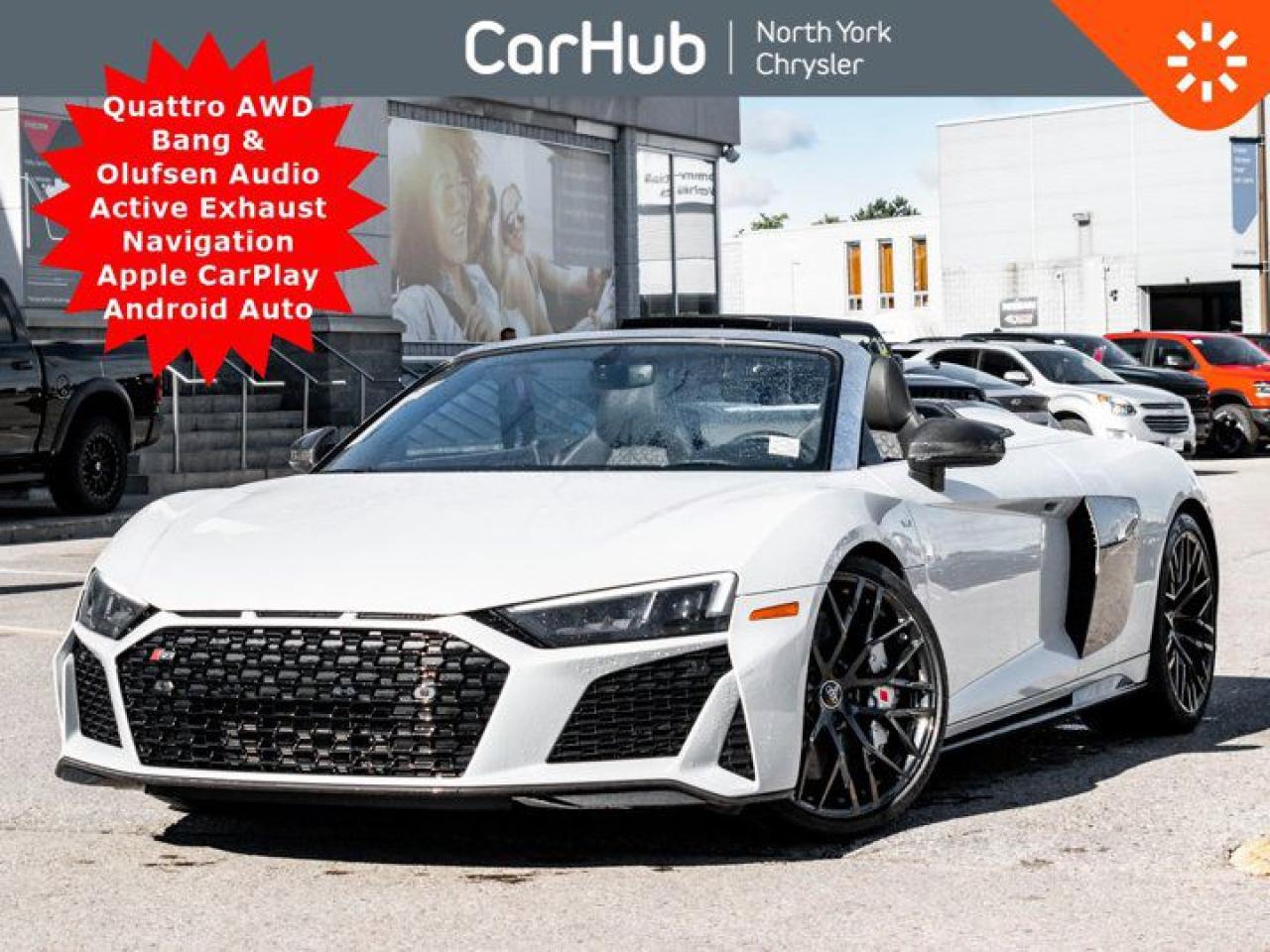 
Only 8,505 km! Experience the uncompromising driving experience of this 2020 Audi R8 Spyder V10 Performance Quattro! It boasts a 602 horsepower Premium Unleaded V-10 5.2 L/318 engine powering this Automatic transmission. Wheels: 20 Black Split Spoke Design.

Clean CARFAX! Our advertised prices are for consumers (i.e. end users) only.

The CARFAX report indicates that it was previously registered in British Columbia, Alberta, & Quebec.

This vehicle also is accident-free -- see Carfax Report.

This vehicle is in excellent condition and has passed a multi point inspection. Vehicle detailed.

Not former rental

 

This Audi R8 Spyder Features the Following Options
 Spyder w/ Black Power Convertible Top & Power Windscreen Heated Power Seats Carbon Interior Trim/Panels Navigation w/ In Dash Display Bang & Olufsen Sound 602 Horsepower V10
 

Active Exhaust, Paddle Shifters, Quattro AWD, Backup Camera w/ Sensors, Android Auto / Apple CarPlay Capable, Wireless Device Charging, AM/FM/SiriusXM-Ready, Bluetooth, WiFi Capable, USB/AUX, CD/SD/SIM, Steering Wheel Mounted Drive Select Control, Lap Time & Sport Displays, Digital Dashboard, Cruise Control, Rain Sensor, Speed Warning, Push Button Start, Electronic Parking Brake, Garage Door Opener, Power Windows & Mirrors, Steering Wheel Media Controls, Auto Lights, Valet Function, Trip Computer, Transmission: 7-Speed S tronic, Transmission w/Driver Selectable Mode and Oil Cooler, Tire Pressure Monitoring System Tire Specific Low Tire Pressure Warning, Sport tuned suspension, Sport Leather/Aluminum Steering Wheel.

Dont miss out on this one!

 

Drive Happy with CarHub

*** All-inclusive, upfront prices -- no haggling, negotiations, pressure, or games

*** Purchase or lease a vehicle and receive a $1000 CarHub Rewards card for service.

*** Purchase this vehicle fully online on CarHub websites

 

Transparency Statement
Online prices and payments are for finance purchases -- please note there is a $750 finance/lease fee. Cash purchases for used vehicles have a $2,200 surcharge (the finance price + $2,200), however cash purchases for new vehicles only have tax and licensing extra -- no surcharge. NEW vehicles priced at over $100,000 including add-ons or accessories are subject to the additional federal luxury tax. While every effort is taken to avoid errors, technical or human error can occur, so please confirm vehicle features, options, materials, and other specs with your CarHub representative. This can easily be done by calling us or by visiting us at the dealership. CarHub used vehicles come standard with 1 key. If we receive more than one key from the previous owner, we include them with the vehicle. Additional keys may be purchased at the time of sale. Ask your Product Advisor for more details. Payments are only estimates derived from a standard term/rate on approved credit. Terms, rates and payments may vary. Prices, rates and payments are subject to change without notice. Please see our website for more details.
