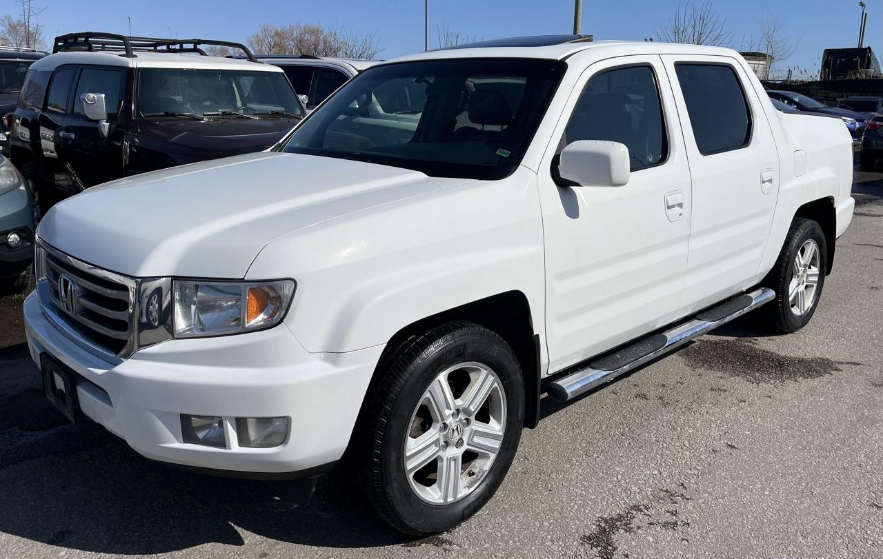 Just Traded in! Beautiful White on Grey Leather Interior 2012 Honda Ridgeline TOURING. 1 OWNER NO ACCIDENTS! GREAT CONDITION! Has 347,830 Kms. Body in GREAT SHAPE with NO RUST. Runs Excellent. No Issues. FULLY LOADED with Navigation System, Backup Camera, Bluetooth, Keyless Entry, Heated Seats, Power Driver Seat, Sunroof, Alloy Wheels, Fog Lights, A/C, CD/AUX, Trailer Hitch, Running Boards, Steering Wheel Audio, Phone, and Cruise Controls! <br/> <br/>  <br/> *AS IS SPECIAL* YOU CERTIFY YOU SAVE! <br/> <br/>  <br/> Safety Certified for an additional $699. <br/> <br/>  <br/> All in price : $6,499 plus HST and licensing. <br/> <br/>  <br/> Call : 647-303-2585 or 647-631-8755 <br/> <br/>  <br/> E-mail : info@bramptonautocenter.ca <br/> <br/>  <br/> Brampton Auto Center <br/> 69 Eastern Avenue, Brampton ON, L6W 1X9. Unit 206 <br/> <br/>  <br/> Brampton Auto Center, welcomes you! Family owned dealership located in the GTA. We take pride in our work. Customer service is our priority. Full disclosure with honesty. We are OMVIC registered and proud member of the UCDA. You are welcomed to get the vehicle checked by any mechanic before purchase, for quality assurance. Financing available for all types of credit! Good, bad or no credit. No problem! We will get you approved. Warranty options available for any year, make or model! Contact dealer for more details. <br/> <br/>  <br/> *This vehicle is being sold AS IS, unfit, and is not represented as being in a road worthy condition, mechanically sound or maintained at any guaranteed level of quality. The vehicle may not be fit for use as a means of transportation and may require substantial repairs at the purchasers expense.* <br/>