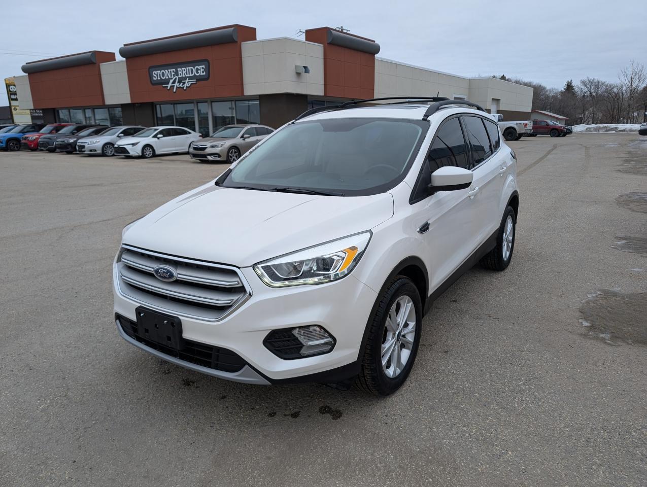 <p>Come finance with us. Apply at stonebridgeauto.com</p><p> </p><p>2018 Ford Escape SEL with 100000km. 1.5L 4 cylinder AWD. Clean title and safetied. Accident free. </p><p> </p><p>Leather interior</p><p>Heated seats</p><p>Power seats</p><p>Navigation</p><p>Back up camera</p><p>Panoramic roof</p><p>Bluetooth</p><p>Auto start/stop</p><p> </p><p>We take trades! Vehicle is for sale in Steinbach by STONE BRIDGE AUTO INC. Dealer #5000 we are a small business focused on customer satisfaction. Text or call before coming to view and as</p><p>k for sales.</p><p> </p>