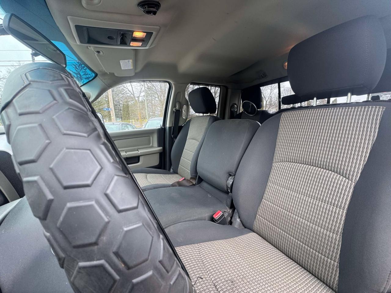 2011 RAM 1500 4WD Quad Cab 140.5" SLT - Photo #14