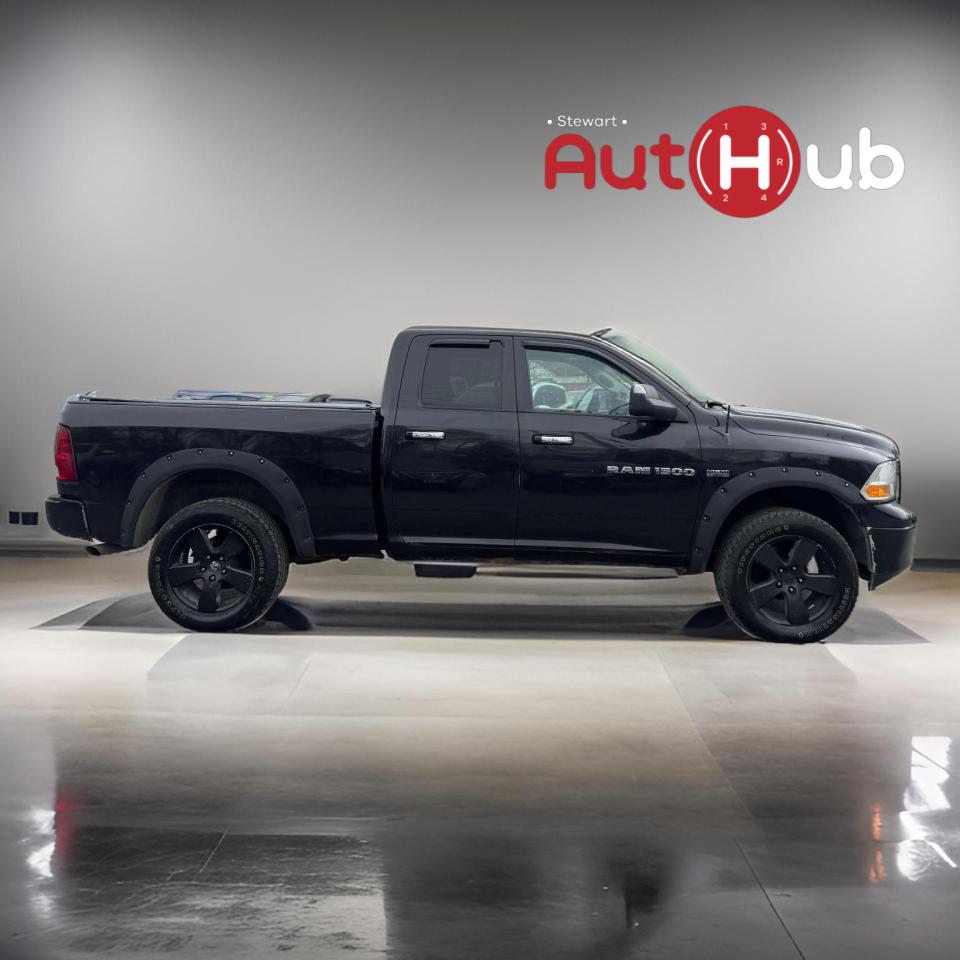 2011 RAM 1500 4WD Quad Cab 140.5" SLT - Photo #8