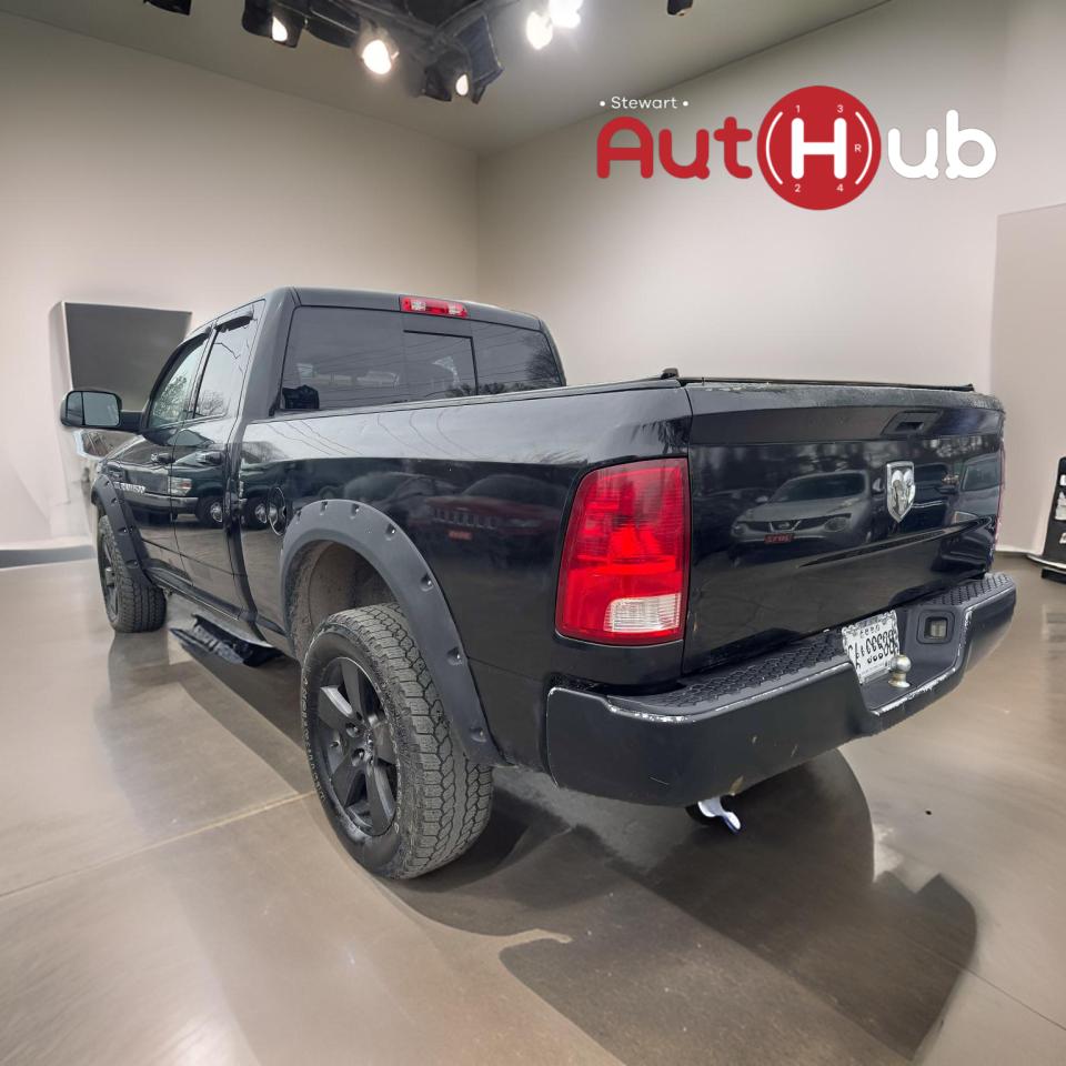 2011 RAM 1500 4WD Quad Cab 140.5" SLT - Photo #5