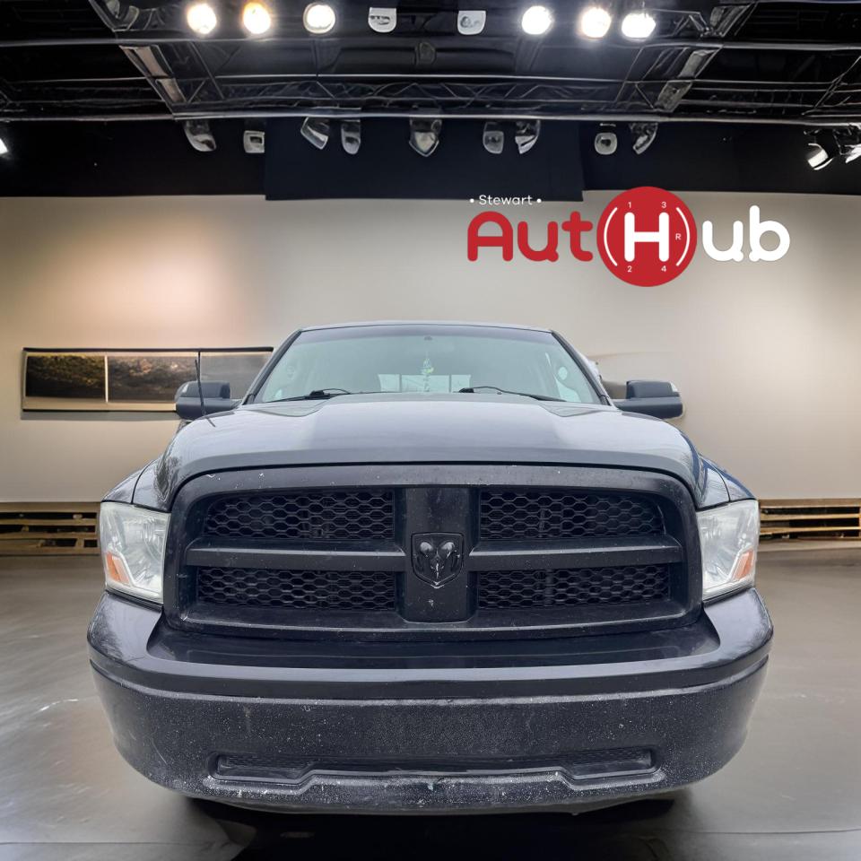 2011 RAM 1500 4WD Quad Cab 140.5" SLT - Photo #2