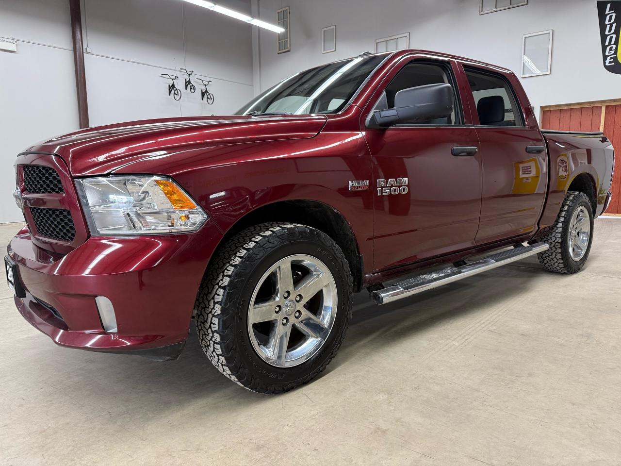 <p>Get ready to unleash your inner adventurer with this rugged and reliable 2018 RAM 1500 Tradesman ST, proudly offered by LuckyDog Motors. This maroon beauty with a grey interior boasts a powerful 5.7L V8 engine and a 4-wheel drive system, ready to tackle any terrain. With 101,489km on the odometer, this truck is just getting warmed up.</p><p>The Tradesman ST package is known for its durability and work-ready features. This truck comes equipped with everything you need to conquer your daily tasks, whether youre hauling cargo or towing a trailer. From the sturdy alloy wheels to the powerful engine, this RAM 1500 is built to last.</p><p>Step inside and youll appreciate the comfortable interior with features like automatic headlights, Bluetooth connectivity, and steering wheel controls. This truck provides convenience and comfort while keeping you safe with features like anti-lock brakes, side airbags, and a rearview camera.</p><p><strong>Sizzle Features:</strong></p><ul><li><strong>Unleash the Power:</strong> The 5.7L V8 engine delivers impressive power and torque for towing and hauling.</li><li><strong>Go Anywhere:</strong> 4-wheel drive gives you confidence to tackle challenging terrain and weather conditions.</li><li><strong>Stay Connected:</strong> Bluetooth connectivity keeps you connected to your phone and music while on the road.</li><li><strong>Peace of Mind:</strong> Anti-lock brakes and side airbags ensure your safety in any situation.</li><li><strong>See Clearly:</strong> The rearview camera provides extra visibility when backing up, making parking and maneuvering a breeze.</li></ul><p>All Vehicles are Sold Certified and come with a 3 month/3,000 km 1-Star Powertrain Drive Global Warranty (extended warranties and coverages available). </p><p>At LuckyDog we believe in transparency, thats why all our vehicles come with a complete CarFax Vehicle report to ensure your not buying a salvaged or rebuilt vehicle. </p><p>* While every reasonable effort is made to ensure the accuracy of this information, some vehicle information may not be exactly as shown. </p>