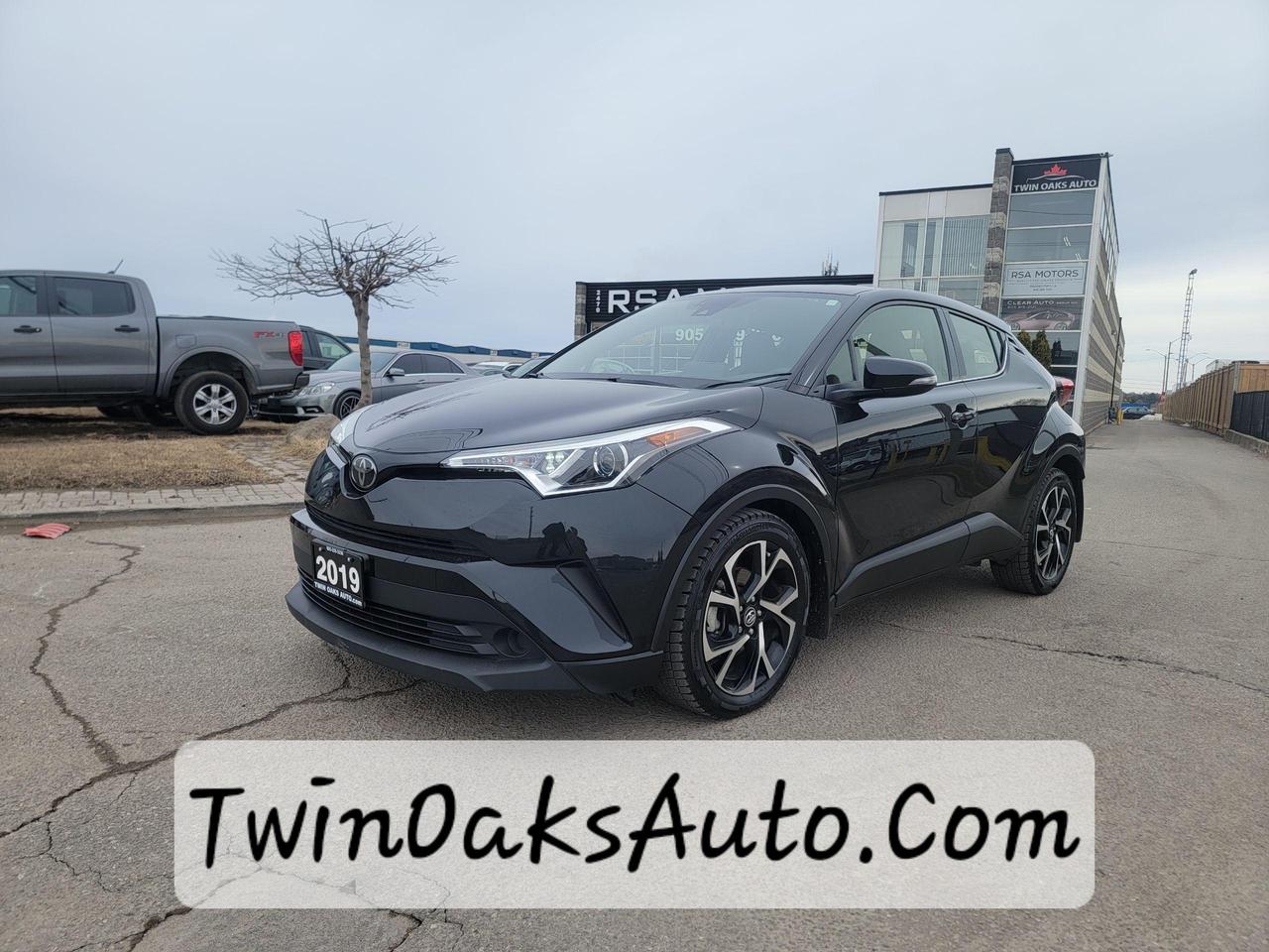 <p><strong>For Sale: 2019 Toyota C-HR Limited &ndash; Stylish, Sporty & Feature-Packed!</strong></p><p>Looking for a modern crossover that stands out? This 2019 Toyota C-HR Limited offers sleek design, advanced technology, and premium comfort. Perfect for city driving or weekend getaways, this C-HR delivers a smooth, fuel-efficient ride with top-tier safety and convenience features.</p><p>Key Features:</p><ul><li>2.0L 4-Cylinder Engine &ndash; Efficient & reliable</li><li>Sporty Design &ndash; Sleek styling with 18-inch alloy wheels</li><li>8-inch Touchscreen &ndash; Apple CarPlay & Android Auto</li><li>Smart Key System &ndash; Push-button start & keyless entry</li><li>Heated Front Seats &ndash; Comfort for any season</li><li>Dual-Zone Climate Control &ndash; Personalized temperature settings</li></ul><p>Safety & Driver Assistance:</p><ul><li>Toyota Safety Sense P &ndash; Pre-Collision System, Lane Departure Alert & more</li><li>Adaptive Cruise Control &ndash; Effortless highway driving</li><li>Blind Spot Monitor & Rear Cross-Traffic Alert &ndash; Extra confidence on the road</li><li>Backup Camera &ndash; Safe and easy parking</li></ul><p>This C-HR Limited is loaded with premium features and ready for its next owner. Don&rsquo;t miss out on this amazing deal!</p><p><strong>Additional Certification Cost</strong>: The full certification cost for this vehicle is <strong>$790 + HST</strong>.</p><p><strong>What&rsquo;s Included with Certification</strong>:</p><ul><li>The vehicle will be delivered with a <strong>valid safety certification</strong> and a <strong>36-day safety item warranty</strong> for your peace of mind.</li><li>A <strong>fresh oil change</strong> will be performed, and all fluids will be topped up.</li><li>The vehicle will be <strong>professionally detailed</strong>, ensuring it looks and feels like new when you pick it up.</li></ul><p>At <strong>Twin Oaks Auto</strong>, we are committed to providing a <strong>hassle-free car buying experience</strong>. From your first inquiry to driving off in your new car, our goal is to get you on the road quickly and stress-free!</p><p><strong>Financing Options Available!</strong><br />Flexible financing options are available to suit your needs. Contact us for more details.</p><p><strong>Contact Us Today</strong>:<br />📞 <strong>Call Us</strong>: 905-339-3330<br />📍 <strong>Location</strong>: 2470 Royal Windsor Drive, Oakville, Ontario, L6J 7Y2</p><p><br />(Conveniently located between Ford Drive and Winston Churchill Blvd.)</p><p><strong>More Information</strong>:<br />Visit our website at <strong><a href=http://www.twinoaksauto.com>TwinOaksAuto.com</a></strong> to view additional pictures, explore our inventory, and access CARFAX reports.</p><p>&nbsp;</p><p>&nbsp;</p>