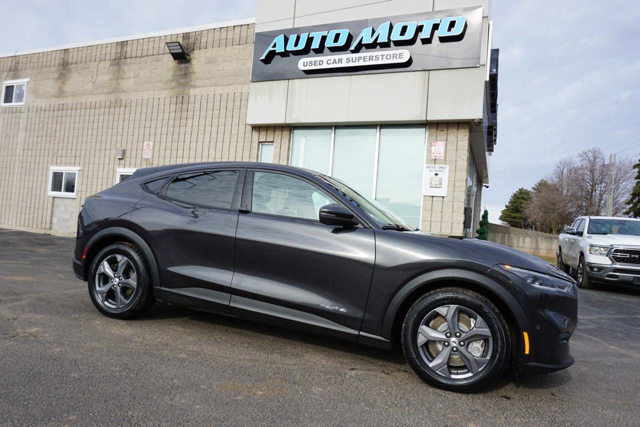 <div>*SAFETY INCLUDED*ONE OWNER*FREE ACCIDENT*FORD MAINTAIN<span>* Very Clean Ford </span>Mustang Mach-E<span> AWD  with Automatic Transmission. Grey on Black Leather Interior. Fully Loaded with: Power Door Locks, Power Windows, and Power Mirrors, CD/AUX/USB, AC, Bluetooth, Alloys, Keyless Entry, Fog Lights, Leather Interior, Back Up Camera, Navigation System, Heated Front Seats, Steering Mounted Controls, Cruise Control, Roof Rack, Dual Climate Control, Power Driving Seat, AND ALL THE POWER OPTIONS. </span></div><br /><div><span>-------------------------------------------------</span><br><span>Financing options are available from 6.96% with $0 Down payment O.A.C.</span><br><span>-------------------------------------------------</span><br><span>SAFETY CERTIFICATION INCLUDED*** Vehicle comes with: Safety Certification, and Car Fax Report ALL INCLUDED!! At no extra cost to you!! Dont miss this opportunity to own a high-quality, pre-owned vehicle. </span><br><span>-------------------------------------------------</span><br><span>Additionally, our vehicles qualify for up to 4 years of extended warranty. Please speak to your sales representative for more information.</span><br><span>-------------------------------------------------</span><br><span>We are open Monday to Saturday from 10am - 6pm, Sundays Closed.</span><br><span>-------------------------------------------------</span><br><span>We also welcome trade-ins, with on-site buyers available to estimate your vehicle on the same day.</span><br><span>-------------------------------------------------</span><br><span>Visit us at 3219 Harvester Road, Burlington, L7N 3N8 or call us at Nine O Five-281-2255 for more information.</span><br><span>------------------------------------------------</span><br><span>Check our inventory at www automotoinc ca</span></div>