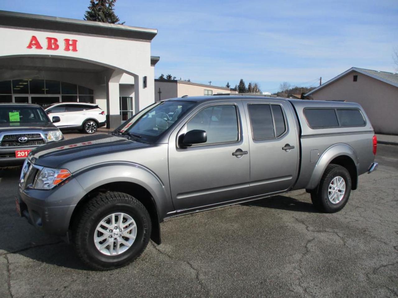 2016 Nissan Frontier SV Crew Cab 4x4  Power, Comfort & Versatility!

Looking for a dependable, adventure-ready truck? This 2016 Nissan Frontier SV Crew Cab 4x4 is powered by a robust 4.0L V6 engine paired with a smooth 5-speed automatic transmission, delivering power and reliability for any road ahead.

Key Features: 4x4 Capability  Ready for off-road adventures or tough weather conditions, Spacious Crew Cab  Comfortable seating for five with ample legroom, Dual-Zone Climate Control  Personalized comfort for driver & passengers, Bluetooth Connectivity  Hands-free calling & audio streaming, Rear Backup Camera & Sensors  Enhanced safety when parking or reversing, Heated Seats  Stay warm on chilly mornings, Traction Control & Cruise Control  Stability and convenience on the road, Fog Lights  Improved visibility in low-light conditions, Matching Canopy  Secure & protect your cargo in style, Alloy Wheels  Sleek and durable design for a smooth ride

This well-maintained Frontier is perfect for work, play, and everything in between. Dont miss outschedule a test drive today! Dlr#9243