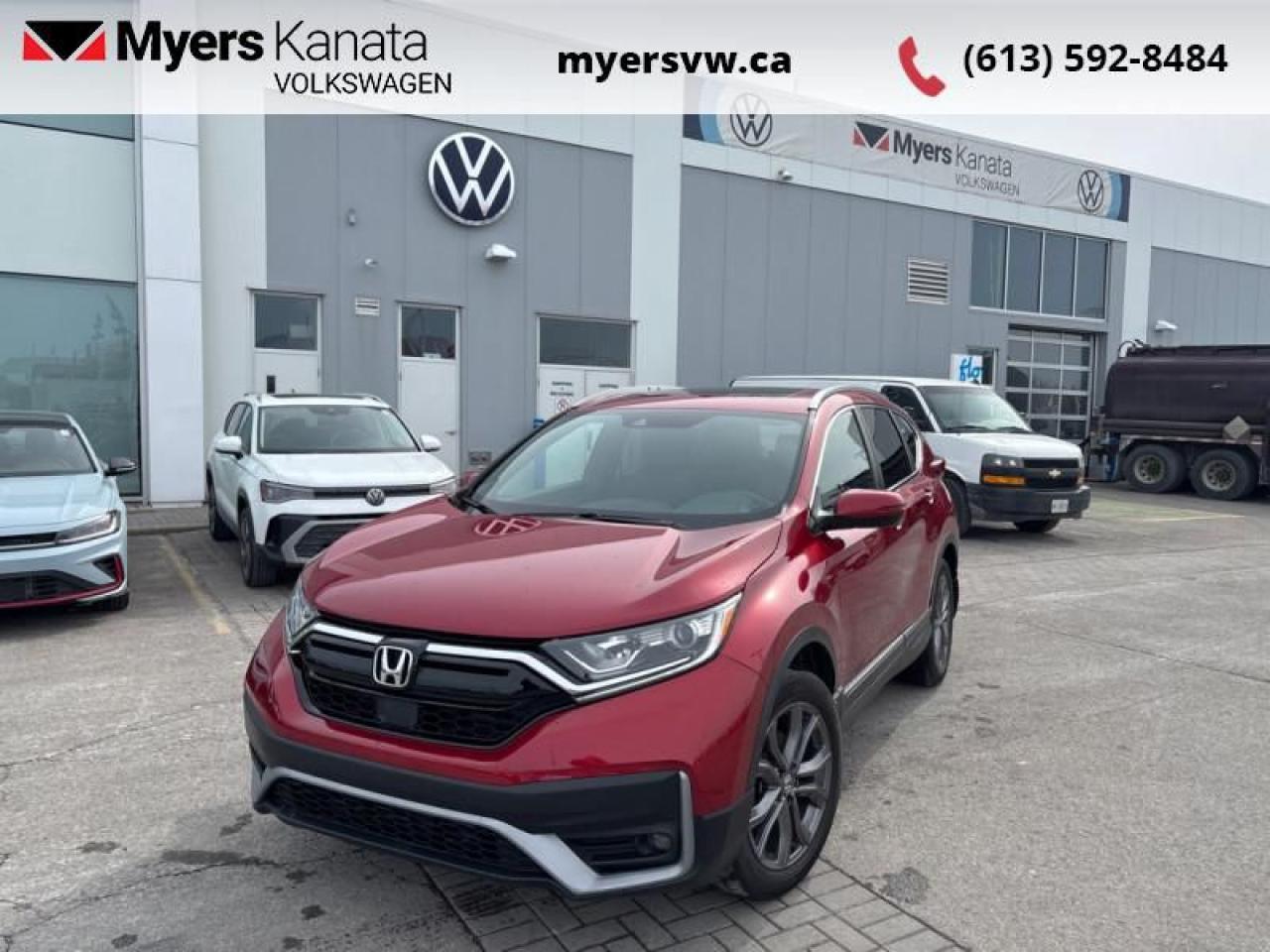 <b>Sunroof,  Blind Spot Display,  Heated Seats,  Automatic Braking,  Lane Keep Assist!</b><br> <br>  Compare at $32946 - Our Price is just $31986! <br> <br>   Whether youre in the concrete jungle or remote mountain campsite, this 2021 Honda CR-V is ready to conquer all types of adventures with you. This  2021 Honda CR-V is fresh on our lot in Kanata. <br> <br>This stylish 2021 Honda CR-V has a spacious interior and car-like handling that captivates anyone who gets behind the wheel. With its smooth lines and sleek exterior, this gorgeous CR-V has no problem turning heads at every corner. Whether youre a thrift-store enthusiast, or a backcountry trail warrior with all of the camping gear, this practical Honda CR-V has got you covered! This  SUV has 72,085 kms. Its  radiant red metallic in colour  . It has an automatic transmission and is powered by a  190HP 1.5L 4 Cylinder Engine.  It may have some remaining factory warranty, please check with dealer for details. <br> <br> Our CR-Vs trim level is Sport. This CR-V Sport has amazing features like a power drivers seat, woodgrain interior, a moonroof, automatic high and low beam headlights, dual-zone automatic climate control, remote start, heated seats, LED daytime running lights, heated power mirrors, and aluminum wheels. The infotainment system includes 7 inch touchscreen with HondaLink, HomeLink home remote system, HandsFreeLink bilingual Bluetooth, Apple CarPlay, Android Auto, rear view camera, and a 6 speaker sound system. You even get a host of safety features such as automatic collision mitigation braking, forward collision warning, lane departure warning, road departure mitigation, and lane keep assist, and a blind spot display. This vehicle has been upgraded with the following features: Sunroof,  Blind Spot Display,  Heated Seats,  Automatic Braking,  Lane Keep Assist,  Apple Carplay,  Android Auto. <br> <br>To apply right now for financing use this link : <a href=https://www.myersvw.ca/en/form/new/financing-request-step-1/44 target=_blank>https://www.myersvw.ca/en/form/new/financing-request-step-1/44</a><br><br> <br/><br>Backed by Myers Exclusive NO Charge Engine/Transmission for life program lends itself for your peace of mind and you can buy with confidence. Call one of our experienced Sales Representatives today and book your very own test drive! Why buy from us? Move with the Myers Automotive Group since 1942! We take all trade-ins - Appraisers on site - Full safety inspection including e-testing and professional detailing prior delivery! <br><br>*LIFETIME ENGINE TRANSMISSION WARRANTY NOT AVAILABLE ON VEHICLES MARKED AS-IS, VEHICLES WITH KMS EXCEEDING 140,000KM, VEHICLES 8 YEARS & OLDER, OR HIGHLINE BRAND VEHICLES (eg.BMW, INFINITI, CADILLAC, LEXUS...). FINANCING OPTIONS NOT AVAILABLE ON VEHICLES MARKED AS-IS OR AS-TRADED.<br> Come by and check out our fleet of 30+ used cars and trucks and 90+ new cars and trucks for sale in Kanata.  o~o