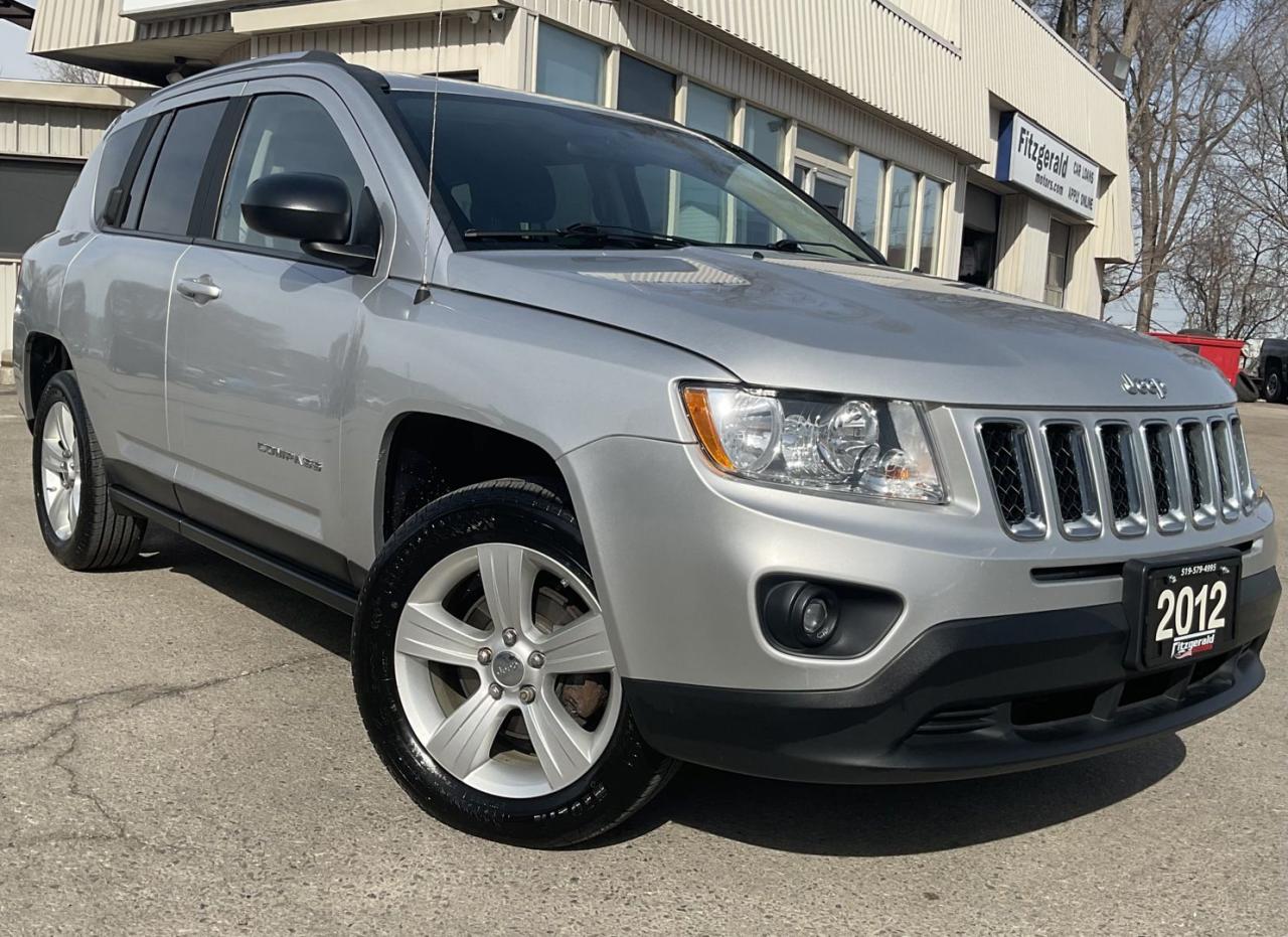 <div><span>Vehicle Highlights:</span><br><span>- Accident free</span><br><span>- </span><span>Dealer serviced</span><br><span>- Low mileage<br><br></span></div><br /><div><span>Just landed on is a lovely Jeep Compass with low mileage and a great price point! This fuel efficient SUV is in excellent condition in and out and drives very well! Dealer serviced since new, must be seen and driven to be appreciated!</span></div><br /><div><span><br>Loaded with the powerful yet fuel efficient 2.4L - 4 cylinder engine, automatic transmission, alloys, fog lights, cloth interior, power locks, power mirrors, power windows, cruise control, A/C, aftermarket touch screen with AM/FM/USB/BT audio, key-less entry, alarm, and more!</span><span><br></span></div><br /><div><span><br>Certified!<br></span><span>Carfax available!<br></span><span>Extended warranty available!<br></span><span>$8,499 PLUS HST & LIC.<br><br></span></div><br /><div><span>Please call us at 519-579-4995 for any questions you have or drop by FITZGERALD MOTORS located at 380 Courtland Ave East. Kitchener, ON for a test drive! Visit us online at </span><a href=http://www.fitzgeraldmotors.com/>www.fitzgeraldmotors.com</a><span> </span></div><br /><div><span><br></span><span>*Even though we take reasonable precautions to ensure that the information provided is accurate and up to date, we are not responsible for any errors or omissions. Please verify all information directly with Fitzgerald Motors to ensure its exactitude.</span></div>