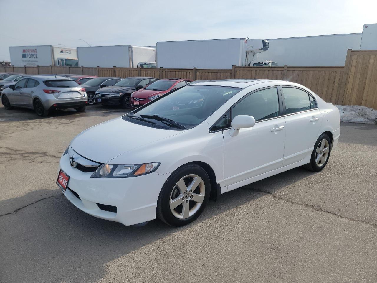 <p><strong>2011 Honda Civic SE / Sport – Low KMs, Sunroof, & Sporty Style!</strong></p><p>This <strong>2011 Honda Civic SE / Sport</strong> is a rare find with <strong>very low kilometers</strong> and a reputation for reliability, efficiency, and sporty design. Perfect for daily driving or weekend adventures, it offers a smooth ride, great fuel economy, and premium features.</p><h3><strong>Key Features:</strong></h3><ul><li><strong>Sporty Exterior</strong> – Sleek design with alloy wheels and a bold stance.</li><li><strong>Power Sunroof</strong> – Enjoy fresh air and open skies with the built-in sunroof.</li><li><strong>Fuel Efficient</strong> – Reliable and economical, ideal for both city and highway driving.</li><li><strong>Low KMs</strong> – Exceptional condition with very low mileage for its year.</li><li><strong>Comfortable Interior</strong> – Spacious cabin with premium materials and climate control.</li><li><strong>Tech & Convenience</strong> – Bluetooth, premium audio system, cruise control, and keyless entry.</li><li><strong>Safety Features</strong> – Airbags, ABS, and stability control for peace of mind.</li></ul><p>This Civic is a perfect blend of performance, comfort, and efficiency. <strong>Act fast—low-mileage Civics don’t last long!</strong> Call today to book a test drive!</p><p> </p><p><strong>Additional Certification Cost</strong>: The full certification cost for this vehicle is <strong>$790 + HST</strong>.</p><p><strong>What’s Included with Certification</strong>:</p><ul><li>The vehicle will be delivered with a <strong>valid safety certification</strong> and a <strong>36-day safety item warranty</strong> for your peace of mind.</li><li>A <strong>fresh oil change</strong> will be performed, and all fluids will be topped up.</li><li>The vehicle will be <strong>professionally detailed</strong>, ensuring it looks and feels like new when you pick it up.</li></ul><p>At <strong>Twin Oaks Auto</strong>, we are committed to providing a <strong>hassle-free car buying experience</strong>. From your first inquiry to driving off in your new car, our goal is to get you on the road quickly and stress-free!</p><p><strong>Financing Options Available!</strong><br />Flexible financing options are available to suit your needs. Contact us for more details.</p><p><strong>Contact Us Today</strong>:<br />📞 <strong>Call Us</strong>: 905-339-3330<br />📍 <strong>Location</strong>: 2470 Royal Windsor Drive, Oakville, Ontario, L6J 7Y2</p><p><br />(Conveniently located between Ford Drive and Winston Churchill Blvd.)</p><p><strong>More Information</strong>:<br />Visit our website at <strong><a href=http://www.twinoaksauto.com>TwinOaksAuto.com</a></strong> to view additional pictures, explore our inventory, and access CARFAX reports.</p><p> </p><p> </p>