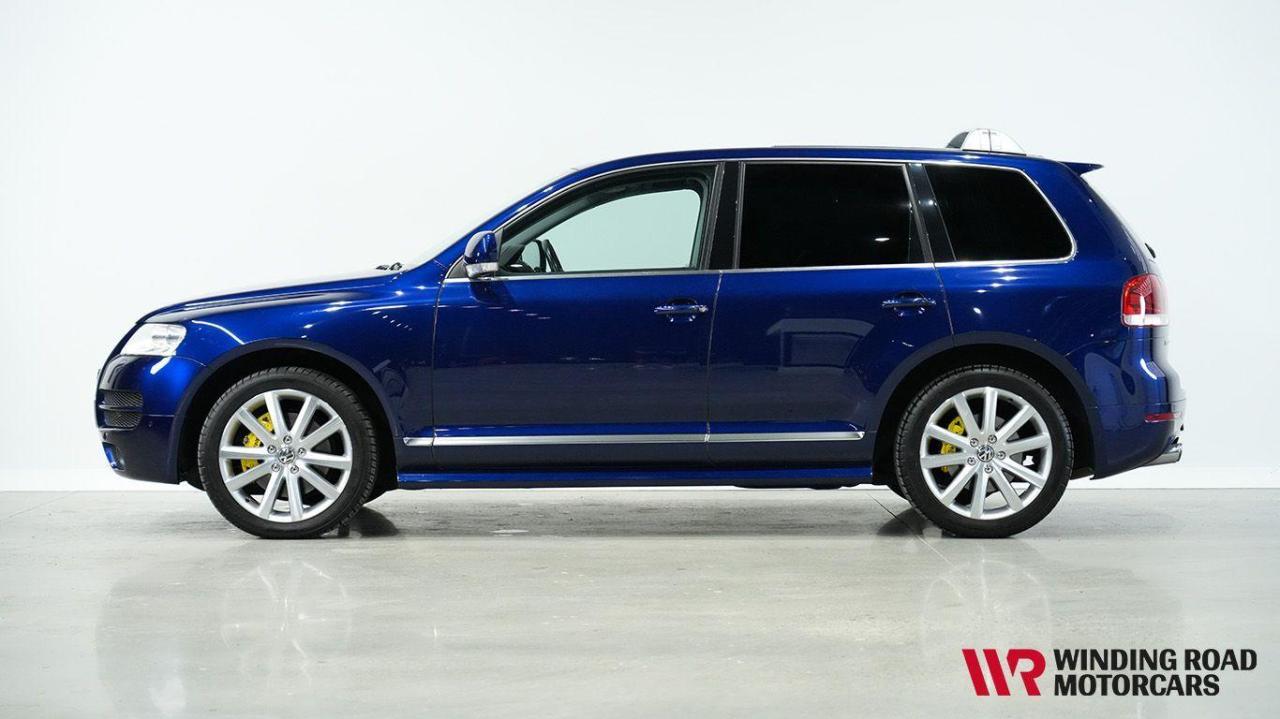 <p><span style=color: #222222; font-family: Bitstream Vera Serif, Times New Roman, serif; font-size: 16px; background-color: #ffffff;>2007 Volkswagen Touareg W12</span><br style=color: #222222; font-family: Bitstream Vera Serif, Times New Roman, serif; font-size: 16px; background-color: #ffffff; /><span style=color: #222222; font-family: Bitstream Vera Serif, Times New Roman, serif; font-size: 16px; background-color: #ffffff;>73,000 Kilometres</span><br style=color: #222222; font-family: Bitstream Vera Serif, Times New Roman, serif; font-size: 16px; background-color: #ffffff; /><span style=color: #222222; font-family: Bitstream Vera Serif, Times New Roman, serif; font-size: 16px; background-color: #ffffff;>Blue</span><br style=color: #222222; font-family: Bitstream Vera Serif, Times New Roman, serif; font-size: 16px; background-color: #ffffff; /><span style=color: #222222; font-family: Bitstream Vera Serif, Times New Roman, serif; font-size: 16px; background-color: #ffffff;>Stock#1764B</span><br style=color: #222222; font-family: Bitstream Vera Serif, Times New Roman, serif; font-size: 16px; background-color: #ffffff; /><br style=color: #222222; font-family: Bitstream Vera Serif, Times New Roman, serif; font-size: 16px; background-color: #ffffff; /><span style=color: #222222; font-family: Bitstream Vera Serif, Times New Roman, serif; font-size: 16px; background-color: #ffffff;>This rare Volkswagen Touareg W12 Executive comes to us with just over 73,000 Kilometers. Sporting a Blue exterior and a tan/black Leather interior, this luxury SUV has just the right look. Standard features include Air Conditioning, parking sensors, Air suspension, power windows and locks, heated front and rear seats and sunroof.</span><br style=color: #222222; font-family: Bitstream Vera Serif, Times New Roman, serif; font-size: 16px; background-color: #ffffff; /><br style=color: #222222; font-family: Bitstream Vera Serif, Times New Roman, serif; font-size: 16px; background-color: #ffffff; /><span style=color: #222222; font-family: Bitstream Vera Serif, Times New Roman, serif; font-size: 16px; background-color: #ffffff;>Now for the heart of the beast. This SUV is powered by a 6.0 litre W12 engine that produces 444 Horsepower and 443 LB-FT of torque. Power is transferred though a 6-speed automatic transmission to all four wheels. This Touareg with the W12 has to be driven to appreciate. The engine runs sewing machine smooth where you can not tell the engine is running.</span><br style=color: #222222; font-family: Bitstream Vera Serif, Times New Roman, serif; font-size: 16px; background-color: #ffffff; /><br style=color: #222222; font-family: Bitstream Vera Serif, Times New Roman, serif; font-size: 16px; background-color: #ffffff; /><span style=color: #222222; font-family: Bitstream Vera Serif, Times New Roman, serif; font-size: 16px; background-color: #ffffff;>Originally delivered in Japan, this VW has been brought over by us to be enjoyed by the North American market. It has been fully inspected, serviced and is B.C registered for its next owner to enjoy.</span><br style=color: #222222; font-family: Bitstream Vera Serif, Times New Roman, serif; font-size: 16px; background-color: #ffffff; /><br style=color: #222222; font-family: Bitstream Vera Serif, Times New Roman, serif; font-size: 16px; background-color: #ffffff; /><span style=color: #222222; font-family: Bitstream Vera Serif, Times New Roman, serif; font-size: 16px; background-color: #ffffff;>We work by appointments so please call, text or email and we will be happy to answer any questions you may have and schedule a viewing. You can also visit our website at www.windingroad.ca to see our other inventory.</span><br style=color: #222222; font-family: Bitstream Vera Serif, Times New Roman, serif; font-size: 16px; background-color: #ffffff; /><br style=color: #222222; font-family: Bitstream Vera Serif, Times New Roman, serif; font-size: 16px; background-color: #ffffff; /><span style=color: #222222; font-family: Bitstream Vera Serif, Times New Roman, serif; font-size: 16px; background-color: #ffffff;>We accept UnionPay, Alipay, Crypto and Bitcoin.</span><br style=color: #222222; font-family: Bitstream Vera Serif, Times New Roman, serif; font-size: 16px; background-color: #ffffff; /><br style=color: #222222; font-family: Bitstream Vera Serif, Times New Roman, serif; font-size: 16px; background-color: #ffffff; /><span style=color: #222222; font-family: Bitstream Vera Serif, Times New Roman, serif; font-size: 16px; background-color: #ffffff;>Trades are always welcome.</span><br style=color: #222222; font-family: Bitstream Vera Serif, Times New Roman, serif; font-size: 16px; background-color: #ffffff; /><br style=color: #222222; font-family: Bitstream Vera Serif, Times New Roman, serif; font-size: 16px; background-color: #ffffff; /><span style=color: #222222; font-family: Bitstream Vera Serif, Times New Roman, serif; font-size: 16px; background-color: #ffffff;>Winding Road Motorcars Inc.</span><br style=color: #222222; font-family: Bitstream Vera Serif, Times New Roman, serif; font-size: 16px; background-color: #ffffff; /><span style=color: #222222; font-family: Bitstream Vera Serif, Times New Roman, serif; font-size: 16px; background-color: #ffffff;>Dealer# 40461</span><br style=color: #222222; font-family: Bitstream Vera Serif, Times New Roman, serif; font-size: 16px; background-color: #ffffff; /><span style=color: #222222; font-family: Bitstream Vera Serif, Times New Roman, serif; font-size: 16px; background-color: #ffffff;>C110-6286 203 St</span><br style=color: #222222; font-family: Bitstream Vera Serif, Times New Roman, serif; font-size: 16px; background-color: #ffffff; /><span style=color: #222222; font-family: Bitstream Vera Serif, Times New Roman, serif; font-size: 16px; background-color: #ffffff;>Langley, B.C</span><br style=color: #222222; font-family: Bitstream Vera Serif, Times New Roman, serif; font-size: 16px; background-color: #ffffff; /><span style=color: #222222; font-family: Bitstream Vera Serif, Times New Roman, serif; font-size: 16px; background-color: #ffffff;>V2Y 3S1</span><br style=color: #222222; font-family: Bitstream Vera Serif, Times New Roman, serif; font-size: 16px; background-color: #ffffff; /><span style=color: #222222; font-family: Bitstream Vera Serif, Times New Roman, serif; font-size: 16px; background-color: #ffffff;>604-764-7225</span></p>