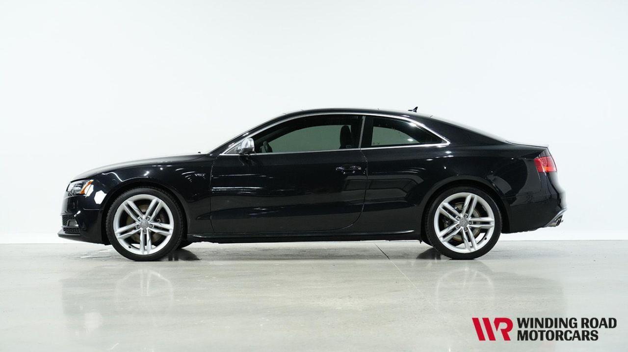 <p><span style=color: #222222; font-family: Bitstream Vera Serif, Times New Roman, serif; font-size: 16px; background-color: #ffffff;>2013 Audi S5</span><br style=color: #222222; font-family: Bitstream Vera Serif, Times New Roman, serif; font-size: 16px; background-color: #ffffff; /><span style=color: #222222; font-family: Bitstream Vera Serif, Times New Roman, serif; font-size: 16px; background-color: #ffffff;>Phantom Black Pearl</span><br style=color: #222222; font-family: Bitstream Vera Serif, Times New Roman, serif; font-size: 16px; background-color: #ffffff; /><span style=color: #222222; font-family: Bitstream Vera Serif, Times New Roman, serif; font-size: 16px; background-color: #ffffff;>60,000 kilometres</span><br style=color: #222222; font-family: Bitstream Vera Serif, Times New Roman, serif; font-size: 16px; background-color: #ffffff; /><span style=color: #222222; font-family: Bitstream Vera Serif, Times New Roman, serif; font-size: 16px; background-color: #ffffff;>Stock # 2014</span><br style=color: #222222; font-family: Bitstream Vera Serif, Times New Roman, serif; font-size: 16px; background-color: #ffffff; /><br style=color: #222222; font-family: Bitstream Vera Serif, Times New Roman, serif; font-size: 16px; background-color: #ffffff; /><span style=color: #222222; font-family: Bitstream Vera Serif, Times New Roman, serif; font-size: 16px; background-color: #ffffff;>This 2013 Audi S5 is the perfect blend of luxury and performance, featuring a 3.0L supercharged V6 engine paired with Audis Quattro AWD system. The cars low mileage and highly optioned features make it a standout. The Phantom Black Pearl exterior is striking, while the meticulously kept interior offers premium comfort and cutting-edge technology.</span><br style=color: #222222; font-family: Bitstream Vera Serif, Times New Roman, serif; font-size: 16px; background-color: #ffffff; /><br style=color: #222222; font-family: Bitstream Vera Serif, Times New Roman, serif; font-size: 16px; background-color: #ffffff; /><span style=color: #222222; font-family: Bitstream Vera Serif, Times New Roman, serif; font-size: 16px; background-color: #ffffff;>With Park Distance Control, a rearview camera, and a Bang & Olufsen sound system, this car is designed to elevate both driving pleasure and convenience. Fully serviced and in excellent condition, its ready for its next owner.</span><br style=color: #222222; font-family: Bitstream Vera Serif, Times New Roman, serif; font-size: 16px; background-color: #ffffff; /><br style=color: #222222; font-family: Bitstream Vera Serif, Times New Roman, serif; font-size: 16px; background-color: #ffffff; /><span style=color: #222222; font-family: Bitstream Vera Serif, Times New Roman, serif; font-size: 16px; background-color: #ffffff;>Dont miss out on this exceptional Audi S5!</span><br style=color: #222222; font-family: Bitstream Vera Serif, Times New Roman, serif; font-size: 16px; background-color: #ffffff; /><br style=color: #222222; font-family: Bitstream Vera Serif, Times New Roman, serif; font-size: 16px; background-color: #ffffff; /><span style=color: #222222; font-family: Bitstream Vera Serif, Times New Roman, serif; font-size: 16px; background-color: #ffffff;>We work by appointment basis only as some of our vehicles may be stored off-site. Please call ahead to ensure the vehicle you are interested in is at our location.</span><br style=color: #222222; font-family: Bitstream Vera Serif, Times New Roman, serif; font-size: 16px; background-color: #ffffff; /><br style=color: #222222; font-family: Bitstream Vera Serif, Times New Roman, serif; font-size: 16px; background-color: #ffffff; /><span style=color: #222222; font-family: Bitstream Vera Serif, Times New Roman, serif; font-size: 16px; background-color: #ffffff;>You can also visit our website at www.windingroad.ca to see our other inventory.</span><br style=color: #222222; font-family: Bitstream Vera Serif, Times New Roman, serif; font-size: 16px; background-color: #ffffff; /><br style=color: #222222; font-family: Bitstream Vera Serif, Times New Roman, serif; font-size: 16px; background-color: #ffffff; /><span style=color: #222222; font-family: Bitstream Vera Serif, Times New Roman, serif; font-size: 16px; background-color: #ffffff;>We accept UnionPay, Alipay, Crypto and Bitcoin.</span><br style=color: #222222; font-family: Bitstream Vera Serif, Times New Roman, serif; font-size: 16px; background-color: #ffffff; /><br style=color: #222222; font-family: Bitstream Vera Serif, Times New Roman, serif; font-size: 16px; background-color: #ffffff; /><span style=color: #222222; font-family: Bitstream Vera Serif, Times New Roman, serif; font-size: 16px; background-color: #ffffff;>Trades are always welcome.</span><br style=color: #222222; font-family: Bitstream Vera Serif, Times New Roman, serif; font-size: 16px; background-color: #ffffff; /><br style=color: #222222; font-family: Bitstream Vera Serif, Times New Roman, serif; font-size: 16px; background-color: #ffffff; /><span style=color: #222222; font-family: Bitstream Vera Serif, Times New Roman, serif; font-size: 16px; background-color: #ffffff;>Winding Road Motorcars Inc.</span><br style=color: #222222; font-family: Bitstream Vera Serif, Times New Roman, serif; font-size: 16px; background-color: #ffffff; /><span style=color: #222222; font-family: Bitstream Vera Serif, Times New Roman, serif; font-size: 16px; background-color: #ffffff;>Dealer# 40461</span><br style=color: #222222; font-family: Bitstream Vera Serif, Times New Roman, serif; font-size: 16px; background-color: #ffffff; /><span style=color: #222222; font-family: Bitstream Vera Serif, Times New Roman, serif; font-size: 16px; background-color: #ffffff;>C110-6286 203 St</span><br style=color: #222222; font-family: Bitstream Vera Serif, Times New Roman, serif; font-size: 16px; background-color: #ffffff; /><span style=color: #222222; font-family: Bitstream Vera Serif, Times New Roman, serif; font-size: 16px; background-color: #ffffff;>Langley, B.C</span><br style=color: #222222; font-family: Bitstream Vera Serif, Times New Roman, serif; font-size: 16px; background-color: #ffffff; /><span style=color: #222222; font-family: Bitstream Vera Serif, Times New Roman, serif; font-size: 16px; background-color: #ffffff;>V2Y 3S1</span><br style=color: #222222; font-family: Bitstream Vera Serif, Times New Roman, serif; font-size: 16px; background-color: #ffffff; /><span style=color: #222222; font-family: Bitstream Vera Serif, Times New Roman, serif; font-size: 16px; background-color: #ffffff;>604-764-7225</span></p>