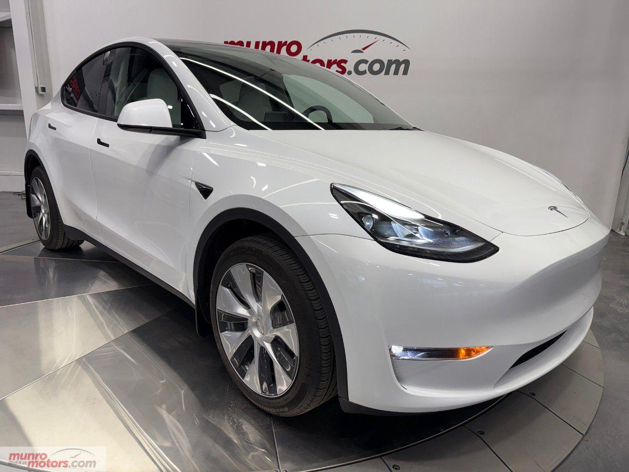 <p><strong>2023 Tesla Model Y Long Range AWD: White on White - A Glimpse Into the Future of Electric Luxury</strong></p><p>The 2023 Tesla Model Y Long Range AWD (All-Wheel Drive) has arrived, offering a blend of cutting-edge technology, style, and performance that makes it a top contender in the electric vehicle (EV) market. One of the most stunning configurations available is the "White on White" color scheme, which showcases a minimalist design and a sleek, modern aesthetic. Let's dive into what makes this electric SUV so desirable, from its elegant exterior to its high-tech interior and robust performance capabilities.</p><p>Exterior: A Vision of Modern Elegance</p><p>The 2023 Tesla Model Y is a sleek and aerodynamic crossover, and its "White on White" color scheme only accentuates its futuristic design. The exterior is painted in a brilliant pearl white, which is both striking and sophisticated, perfectly complementing the vehicle's clean lines and minimalist styling. The Model Y has a sporty yet refined look, with a tapered roofline, smooth curves, and aggressive front fascia. The large, flush door handles and the absence of visible tailpipes emphasize its advanced electric nature.</p><p>The 20-inch wheels, available in a variety of styles, add a sense of sportiness, while the all-wheel drive ensures you can confidently navigate a variety of road conditions, from city streets to challenging weather environments.</p><p>Interior: Futuristic Comfort</p><p>Step inside, and the "White on White" theme continues with an interior thats both luxurious and forward-thinking. The cabin features premium white vegan leather upholstery, offering an airy, light-filled environment. Its the perfect match for the clean, minimalist aesthetic that Tesla has become known for. The seats are designed for comfort with a focus on providing ample support during long journeys while maintaining a contemporary look.</p><p>One of the standout features of the Model Y's interior is the massive 15-inch touchscreen, which is the center of control for almost every aspect of the car, from climate control to media settings. Teslas user-friendly interface ensures that you have all the information you need right at your fingertips. In addition, the cabin features panoramic glass roof panels, allowing passengers to enjoy an open and expansive feel, adding to the overall sense of spaciousness and luxury.</p><p>The rear seats can be folded flat, providing a generous amount of cargo space, making it a practical choice for families or anyone who needs extra room for their gear. Teslas attention to detail ensures that the interior, while futuristic, remains functional and comfortable for daily use.</p><p>Performance: Power, Range, and Efficiency</p><p>When it comes to performance, the 2023 Tesla Model Y Long Range AWD doesnt disappoint. Powered by dual electric motors, it delivers a quick and smooth ride with impressive acceleration. The Model Y can go from 0 to 60 mph in just 4.8 seconds, an astonishing feat for a compact SUV. Thanks to the dual motors and Tesla's proprietary all-wheel-drive system, the Model Y is capable of handling a wide range of weather conditions, including rain, snow, and ice.</p><p>One of the biggest advantages of the Model Y Long Range is its exceptional driving range. With an estimated range of up to 330 miles on a single charge (depending on driving conditions), the Model Y allows you to go further between charging stops, making it perfect for long road trips or daily commutes without range anxiety. The cars regenerative braking system helps recharge the battery as you drive, improving overall efficiency and extending range.</p><p>Teslas Supercharger network makes long-distance travel even easier. With fast-charging capabilities, the Model Y can regain up to 162 miles of range in just 15 minutes at one of Teslas Supercharger stations, so you can get back on the road in no time.</p><p>Technology: A Connected Experience</p><p>Tesla is synonymous with innovation, and the Model Y Long Range AWD is no exception. The vehicle is equipped with advanced driver-assist features, including Teslas Autopilot, which can manage steering, acceleration, and braking on highways and in traffic. This semi-autonomous system provides an added layer of convenience and safety, but drivers should always remain attentive and ready to take control.</p><p>Other notable tech features include a premium sound system, built-in navigation with real-time traffic updates, over-the-air software updates, and compatibility with Teslas mobile app, which allows you to remotely control aspects of the car, such as unlocking doors or pre-conditioning the cabin.</p><p>Safety is also a top priority for Tesla, and the Model Y comes with a comprehensive suite of safety features. From its robust crash protection to its advanced sensors and cameras that provide 360-degree visibility, the Model Y is designed to protect its occupants and prevent accidents before they happen.</p><p>Sustainability: Driving the Future</p><p>As with all Tesla vehicles, sustainability is at the core of the Model Y's design. With zero emissions, the Model Y offers a clean alternative to traditional internal combustion engine vehicles, contributing to a reduction in the overall carbon footprint. Teslas commitment to renewable energy extends beyond the car itself, with options for owners to install solar panels or energy storage solutions at home to reduce their dependence on non-renewable energy sources.</p><p>This Tesla Model Y LR AWD has a clean Carfax . Come on down to Munro Motors & see this one for yourself, its in stock. We will look forward to seeing you real soon!</p><p></p><p><span style=color:rgb( 51 , 51 , 51 )>CarFax:</span><a href=https://vhr.carfax.ca/?id=Xf2uPxGufZJPh2kg1pyFsuR9aYiofzKQ&_jstate=qJC4F9ynupF4TLcpc7zy_KiQuBfcp7qReEy3KXO8 rel=nofollow>https://vhr.carfax.ca/?id=Xf2uPxGufZJPh2kg1pyFsuR9aYiofzKQ&_jstate=qJC4F9ynupF4TLcpc7zy_KiQuBfcp7qReEy3KXO8</a></p><p></p><p></p><p><span style=color:rgb( 51 , 51 , 51 )>Yes we take trade in vehicles.</span></p><p><span style=color:rgb( 51 , 51 , 51 )>Check us out on youtube: </span><a href=https://www.youtube.com/user/MunroMotors1 rel=nofollow>click here</a></p><p><span style=color:rgb( 51 , 51 , 51 )>Like us on Facebook: </span><a href=https://www.facebook.com/munromotors/ rel=nofollow>https://www.facebook.com/munromotors/</a></p><p><span style=color:rgb( 51 , 51 , 51 )>We are located in Brantford, Ontario; Telephone City and the hometown of hockey legend Wayne Gretzky. Formerly located in St. George, Ontario for ten years, we are still east of London, south of Cambridge, and west of Hamilton.</span></p><p><span style=color:rgb( 51 , 51 , 51 )>In order to get our customers to come here, we have to have great prices and then when you get here, we have to have a great car in order to earn your business.</span></p><p><span style=color:rgb( 51 , 51 , 51 )>Our business hours are Monday to Friday 10am to 5pm. We are closed on Saturdays and Sundays.</span></p><p><span style=color:rgb( 51 , 51 , 51 )>At Munro Motors, we find unique vehicles and post our entire stock online in order to ensure that our vehicles find their happy home.</span></p><p><span style=color:rgb( 51 , 51 , 51 )>To ensure our customers can get what they've always wanted, we offer financing services through TD Auto Finance, Desjardins, CIBC Auto Finance and Independent Leasing Companies on vehicles that are less than ten model years old and boats that are less than twenty-five model years old.</span></p><p><span style=color:rgb( 51 , 51 , 51 )>We also offer warranty products through Lubrico and GVC warranties to ensure that your mechanical baby stays in tip-top condition. Because of our customer focused service we have been delivering vehicles to Switzerland, Finland, Rotterdam, Emo, Thunder Bay, Kapuskasing, Halifax, Sudbury, Sault Ste. Marie, Cornwall, Fort Francis, Kelowna, Montréal, Saskatchewan, Virginia, Newfoundland, Edmonton, Ottawa, Fredericton and Winnipeg, as well as Cambridge, Kitchener, Waterloo, Barrie, Windsor, London, Pickering, Peterborough, Oshawa, Sante Fe New Mexico, Blind River, the Greater Toronto Area, and even so far as the Czech Republic!</span></p><p><span style=color:rgb( 51 , 51 , 51 )>All of our vehicles are hand-picked by the very knowledgeable owner, Andy Munro, who has been connecting people to their dreams for many years.</span></p><p><a href=http://Munromotors.com rel=nofollow><span style=color:rgb( 51 , 51 , 51 )>Munromotors.com</span></a></p><p><span style=color:rgb( 51 , 51 , 51 )>Email: </span><span style=color:rgb( 51 , 51 , 51 )><u>sales@munromotors.com</u></span></p><p><span style=color:rgb( 51 , 51 , 51 )>Most of our vehicles are already reconditioned, saftied, etested and ready to drive home with you.</span></p><p><span style=color:rgb( 51 , 51 , 51 )>Delivery is available. Ask for details</span></p><p><span style=color:rgb( 51 , 51 , 51 )>All prices are subject to HST and licensing, no hidden fees.</span></p><p><span style=color:rgb( 51 , 51 , 51 )>Financing is available for good credit and bruised credit. OAC as low as 7.99% for well qualified applicants. Ask us for details.</span></p>