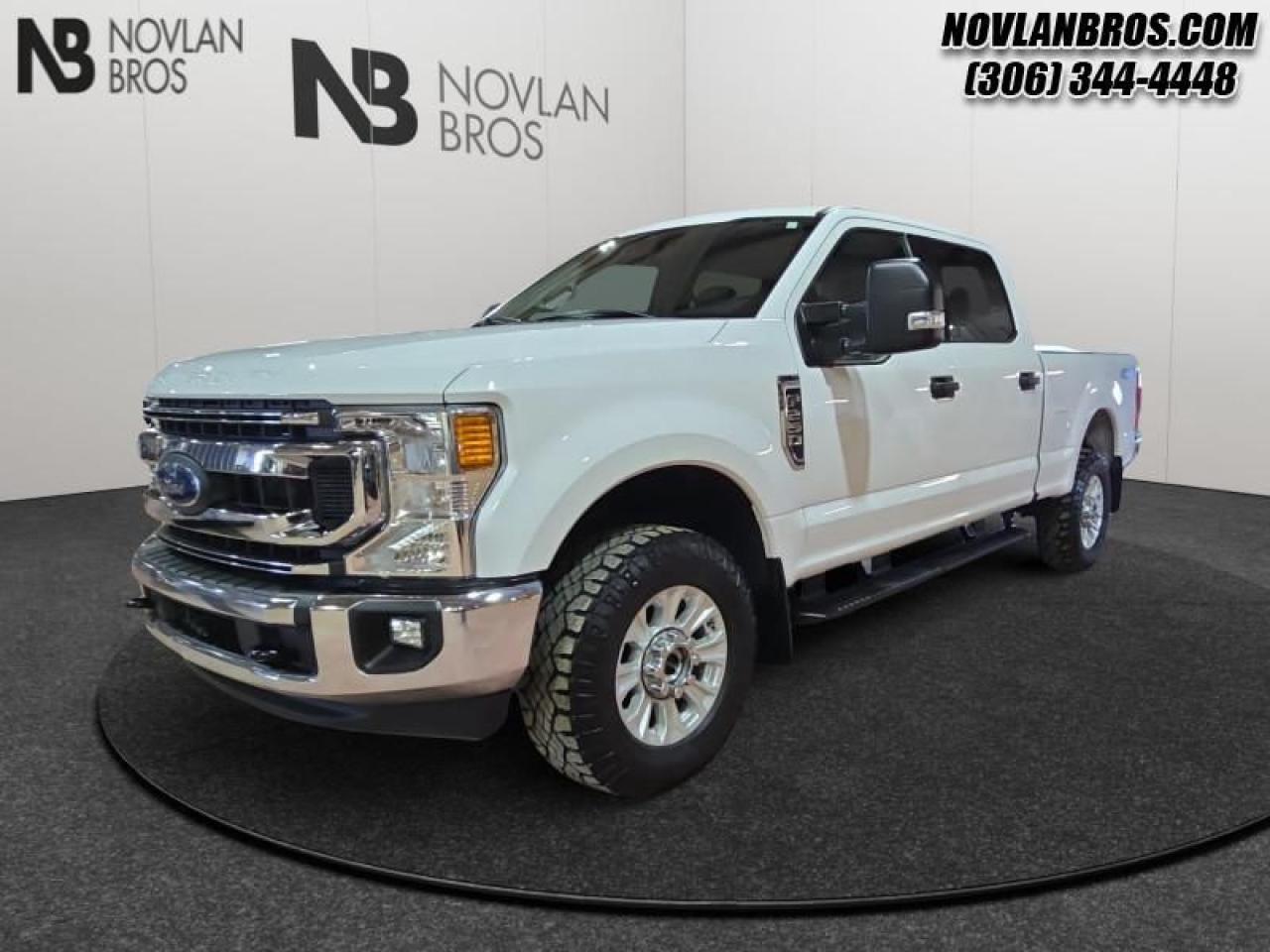 <b>Reverse Sense System, Rear View Camera, Bench Seats, CD Player, Fog Lights!</b><br> <br> Check out our great inventory of pre-owned vehicles at Novlan Brothers!<br> <br>   If you have the need to haul or tow heavy loads, this Ford F-250 should be at the top of your consideration list. This  2021 Ford F-250 Super Duty is for sale today in Paradise Hill. <br> <br>The most capable truck for work or play, this heavy-duty Ford F-250 never stops moving forward and gives you the power you need, the features you want, and the style you crave! With high-strength, military-grade aluminum construction, this F-250 Super Duty cuts the weight without sacrificing toughness. The interior design is first class, with simple to read text, easy to push buttons and plenty of outward visibility. This truck is strong, extremely comfortable and ready for anything. This  Crew Cab 4X4 pickup  has 85,574 kms. Its  white in colour  . It has a 6 speed automatic transmission and is powered by a  385HP 6.2L 8 Cylinder Engine.  It may have some remaining factory warranty, please check with dealer for details. <br> <br> Our F-250 Super Dutys trim level is XLT. Upgrading to this F-250 XLT is a great choice as it includes some useful features such as aluminum wheels, chrome exterior accents with a rear bumper step, a class V trailer hitch and power heated side telescoping mirrors. It also includes Ford Co-Pilot360, lane keep warning, blind spot monitoring, pre-collision assist with automatic emergency braking and a smart device remote engine start. Additional features are a power locking tailgate with remote keyless entry, SYNC 3 with SiriusXM radio and streaming audio capable, a rear view camera, FordPass Connect 4G LTE, power windows, cruise control and plenty more. This vehicle has been upgraded with the following features: Reverse Sense System, Rear View Camera, Bench Seats, Cd Player, Fog Lights, Intermittent Wipers, Keyless Entry. <br> To view the original window sticker for this vehicle view this <a href=http://www.windowsticker.forddirect.com/windowsticker.pdf?vin=1FT7W2B65MEC00245 target=_blank>http://www.windowsticker.forddirect.com/windowsticker.pdf?vin=1FT7W2B65MEC00245</a>. <br/><br> <br>To apply right now for financing use this link : <a href=http://novlanbros.com/credit/ target=_blank>http://novlanbros.com/credit/</a><br><br> <br/><br> Payments from <b>$688.40</b> monthly with $0 down for 84 months @ 8.99% APR O.A.C. ( Plus applicable taxes -  Plus applicable fees   ).  See dealer for details. <br> <br>The Novlan family is owned and operated by a third generation and committed to the values inherent from our humble beginnings.<br> Come by and check out our fleet of 20+ used cars and trucks and 60+ new cars and trucks for sale in Paradise Hill.  o~o