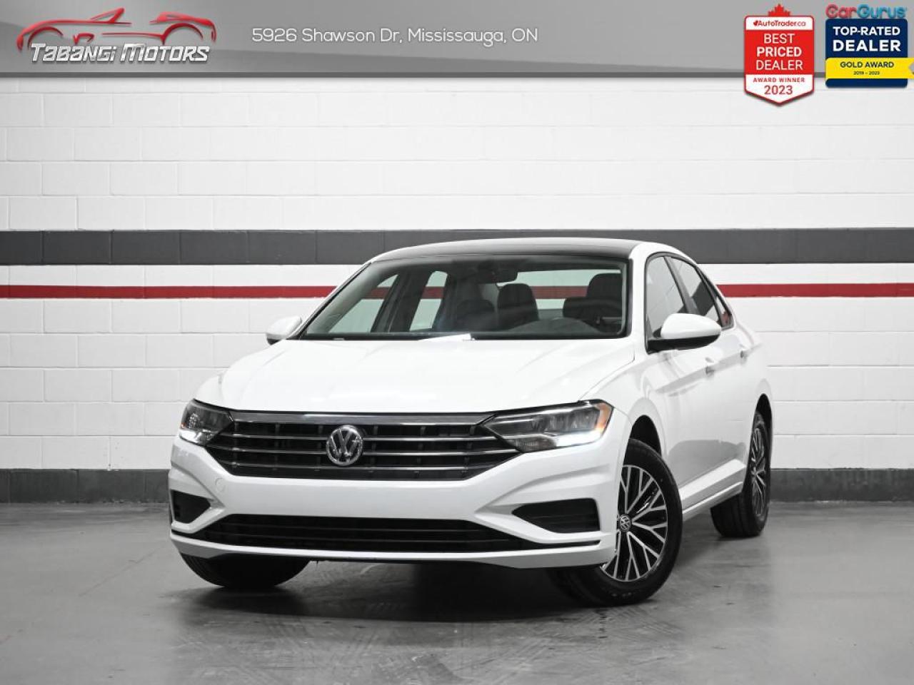 <b>Leather, Apple Carplay, Android Auto, Navigation, Sunroof, Heated Seats, Blind Spot, Rear Cross Traffic Alert, Push Button Start, Keyless Entry!</b><br>  Tabangi Motors is family owned and operated for over 20 years and is a trusted member of the Used Car Dealer Association (UCDA). Our goal is not only to provide you with the best price, but, more importantly, a quality, reliable vehicle, and the best customer service. Visit our new 25,000 sq. ft. building and indoor showroom and take a test drive today! Call us at 905-670-3738 or email us at customercare@tabangimotors.com to book an appointment. <br><hr></hr>CERTIFICATION: Have your new pre-owned vehicle certified at Tabangi Motors! We offer a full safety inspection exceeding industry standards including oil change and professional detailing prior to delivery. Vehicles are not drivable, if not certified. The certification package is available for $595 on qualified units (Certification is not available on vehicles marked As-Is). All trade-ins are welcome. Taxes and licensing are extra.<br><hr></hr><br> <br><iframe width=100% height=350 src=https://www.youtube.com/embed/kjizpjXH0hU?si=GmyB-5pJNzebTZhZ title=YouTube video player frameborder=0 allow=accelerometer; autoplay; clipboard-write; encrypted-media; gyroscope; picture-in-picture; web-share referrerpolicy=strict-origin-when-cross-origin allowfullscreen></iframe><br><br><br>   With a very well utilized interior and excellent fit and finish, this 2021 Jetta is simply a pleasure to ride in. This  2021 Volkswagen Jetta is fresh on our lot in Mississauga. <br> <br>Redesigned. Not over designed. Rather than adding needless flash, the Jetta has been redesigned for a tasteful, more premium look and feel. One quick glance is all it takes to appreciate the result. Its sporty. Its sleek. It makes a statement without screaming. The overall effect stands out anywhere. Its roomy and well finished interior provides the best of comforts and will help keep this elegant sedan ageless and beautiful for many years to come.This  sedan has 83,843 kms. Its  white in colour  . It has a 8 speed automatic transmission and is powered by a  147HP 1.4L 4 Cylinder Engine.  It may have some remaining factory warranty, please check with dealer for details.  This vehicle has been upgraded with the following features: Air, Tilt, Cruise, Power Windows, Power Locks, Power Mirrors, Back Up Camera. <br> <br>To apply right now for financing use this link : <a href=https://tabangimotors.com/apply-now/ target=_blank>https://tabangimotors.com/apply-now/</a><br><br> <br/><br>SERVICE: Schedule an appointment with Tabangi Service Centre to bring your vehicle in for all its needs. Simply click on the link below and book your appointment. Our licensed technicians and repair facility offer the highest quality services at the most competitive prices. All work is manufacturer warranty approved and comes with 2 year parts and labour warranty. Start saving hundreds of dollars by servicing your vehicle with Tabangi. Call us at 905-670-8100 or follow this link to book an appointment today! https://calendly.com/tabangiservice/appointment. <br><hr></hr>PRICE: We believe everyone deserves to get the best price possible on their new pre-owned vehicle without having to go through uncomfortable negotiations. By constantly monitoring the market and adjusting our prices below the market average you can buy confidently knowing you are getting the best price possible! No haggle pricing. No pressure. Why pay more somewhere else?<br><hr></hr>WARRANTY: This vehicle qualifies for an extended warranty with different terms and coverages available. Dont forget to ask for help choosing the right one for you.<br><hr></hr>FINANCING: No credit? New to the country? Bankruptcy? Consumer proposal? Collections? You dont need good credit to finance a vehicle. Bad credit is usually good enough. Give our finance and credit experts a chance to get you approved and start rebuilding credit today!<br> o~o