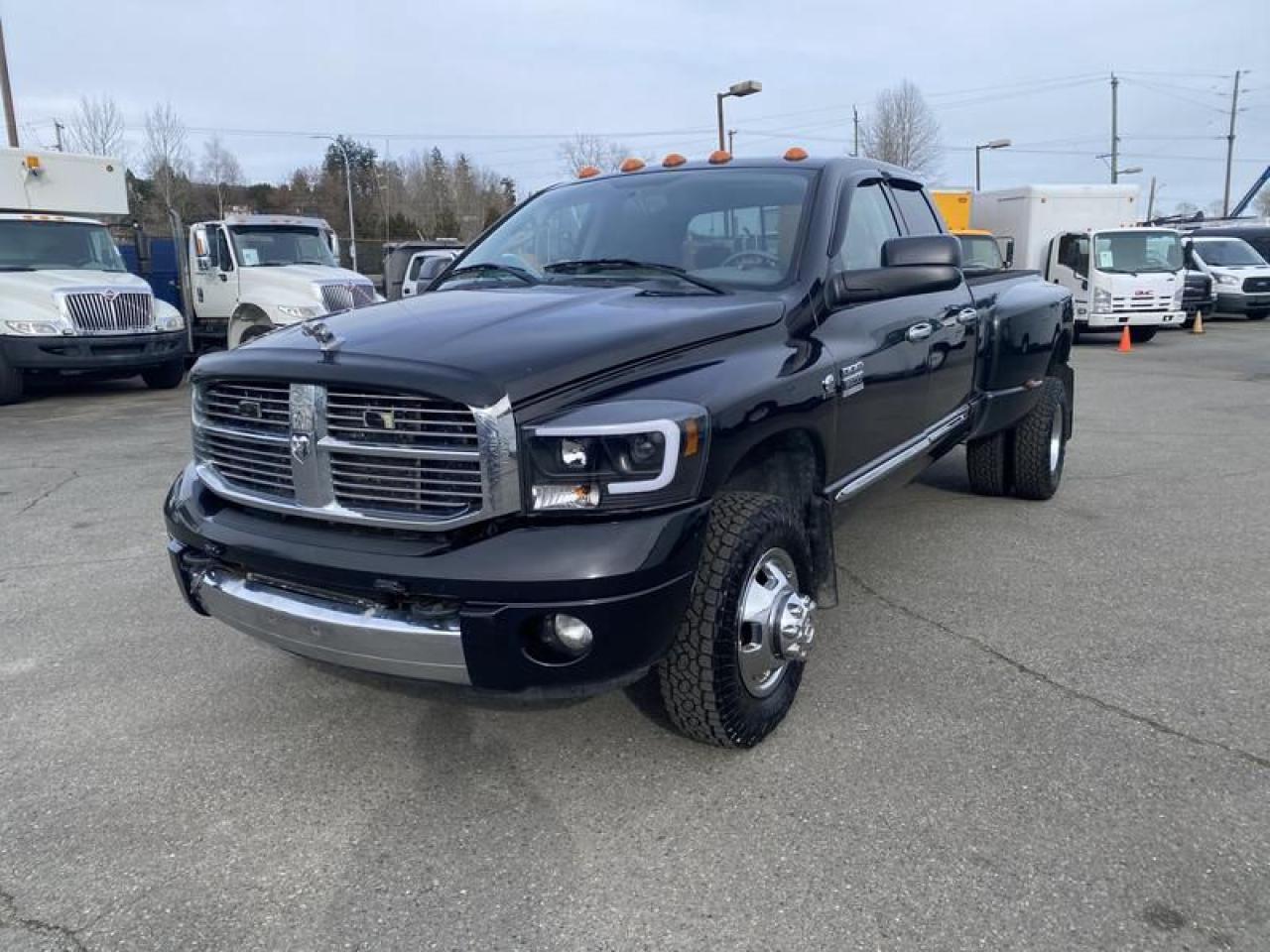 2008 Dodge Ram 3500 Quad Cab Long Box 4WD Dually Diesel, 6.7L L6 OHV 24V TURBO DIESEL engine, 6 cylinder, 4 door, automatic, 4WD, 4-Wheel ABS, cruise control, air conditioning, AM/FM radio, CD player, power door locks, power windows, black exterior, tan interior, leather. This Listing Has Rebuilt Status  $16,870.00 plus $375 processing fee, $17,245.00 total payment obligation before taxes.  Listing report, warranty, contract commitment cancellation fee, financing available on approved credit (some limitations and exceptions may apply). All above specifications and information is considered to be accurate but is not guaranteed and no opinion or advice is given as to whether this item should be purchased. We do not allow test drives due to theft, fraud, acts of vandalism and undetectable impaired driving. Instead we provide the following benefits: Complimentary Warranty (with options to extend), Limited Money Back Satisfaction Guarantee on Fully Completed Contracts, Contract Commitment Cancellation, and an Open-Ended Sell-Back Option. Ask seller for details or call 604-522-REPO(7376) to confirm listing availability.