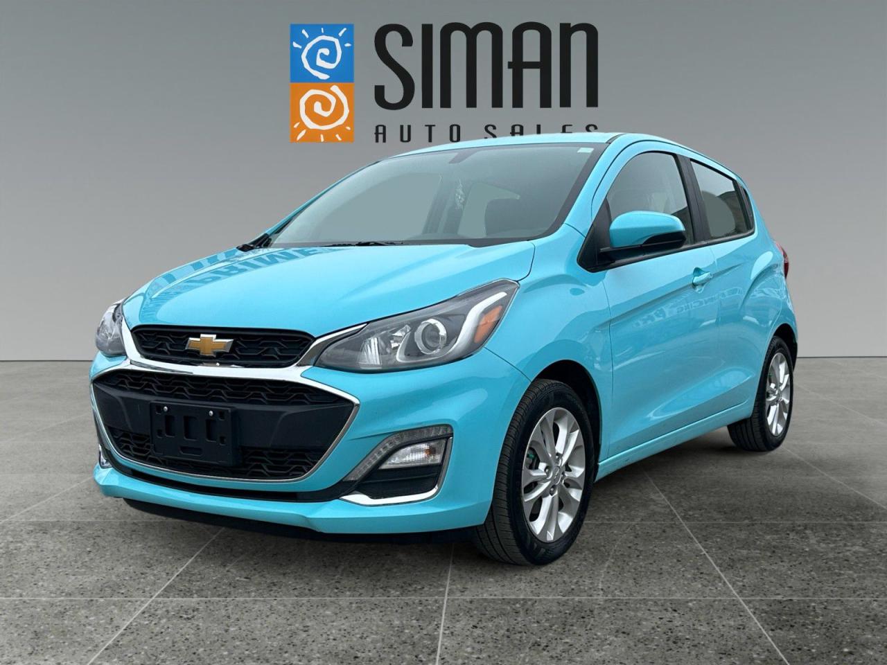 <p><strong>SASKATCHEWAN VEHICLE LOW KM</strong></p>

<p>Our 2021 Chevrolet Spark LT has been through a <strong>presale inspection fresh full synthetic oil service. Carfax reports Saskatchewan vehicle Low Km. Financing Available on site Trades Encouraged. Aftermarket warranties available to fit every need and budget.</strong> Many automakers have discontinued their extra-small cars in recent years, preferring to focus on extra-small crossover SUVs instead. But Chevrolet is still keeping the flame lit with its 2021 Spark. This hatchback might be little, but its big on value and fuel economy. If you need a vehicle to fit into tight spaces or zip around urban environments, and want to do it on a budget, the Spark checks those boxes. 7-inch touchscreen,Apple CarPlay and Android Auto compatibility Bluetooth connectivity, Two USB ports, Air conditioning, OnStar emergency communications with onboard Wi-Fi hotspot, 1LT adds on: 15-inch alloy wheels, Power windows, mirrors and door locks, Audio and phone controls on steering wheel, Cruise control Remote keyless entry, Six-speaker audio system,</p>

<p><span style=color:#2980b9><strong>Siman Auto Sales is large enough to make a difference but small enough to care. We are family owned and operated, and have been proudly serving Saskatchewan car buyers since 1998. We offer on site financing, consignment, automotive repair and over 90 preowned vehicles to choose from.</strong></span></p>