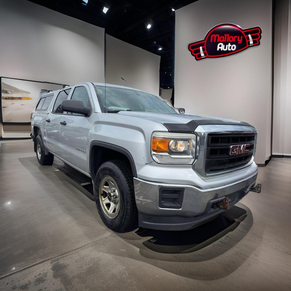 <p><strong>2014 GMC Sierra 1500 4WD Crew Cab Short Box | Powerful & Versatile Pickup | Available at TrueNorth Auto Brokers</strong></p><p>Get the job done in style with this <strong>2014 GMC Sierra 1500 4WD Crew Cab</strong>! Built for <strong>power, durability, and comfort</strong>, this truck is perfect for work, towing, or weekend adventures.</p><p>✅ <strong>Key Features:</strong><br />✔ <strong>Engine:</strong> 5.3L V8 – Strong & Reliable Performance<br />✔ <strong>Transmission:</strong> Automatic<br />✔ <strong>Drivetrain:</strong> 4WD – Ready for Any Terrain<br />✔ <strong>Cab:</strong> Crew Cab – Spacious Interior for Passengers<br />✔ <strong>Bed:</strong> Short Box – Versatile & Practical for Work or Play<br />✔ <strong>Technology:</strong> Touchscreen Infotainment, Bluetooth, Rearview Camera<br />✔ <strong>Towing Capacity:</strong> Built Tough for Heavy Loads<br />✔ <strong>Safety:</strong> ABS, Traction Control, Multiple Airbags</p><p>This <strong>Sierra 1500 Crew Cab</strong> is a perfect mix of strength, comfort, and modern features—ideal for any truck enthusiast.</p><p> </p><p>💰 <strong>Price excludes taxes and a $59 licensing fee.</strong></p>