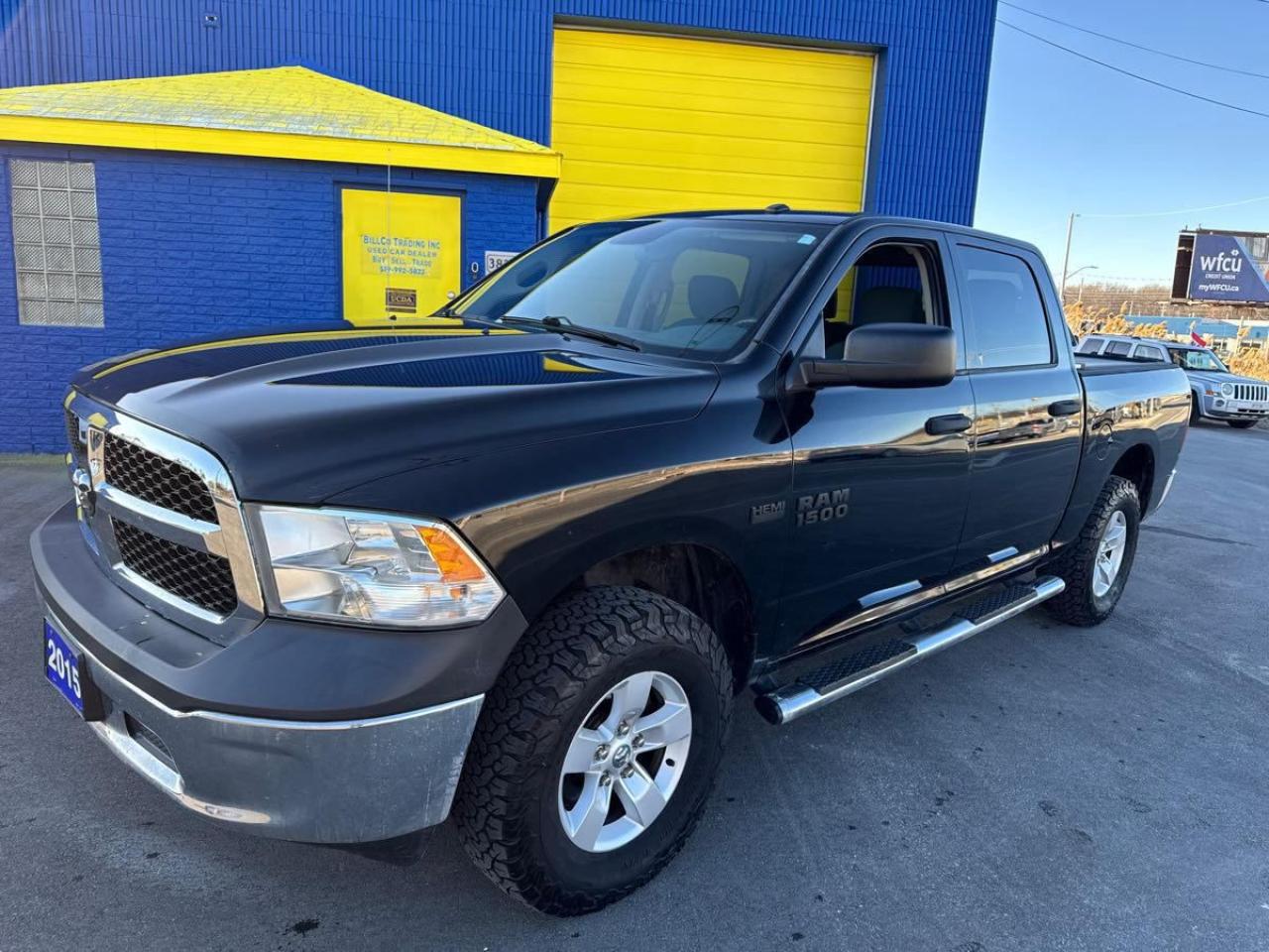 Used 2015 RAM 1500 4WD Crew Cab 140.5