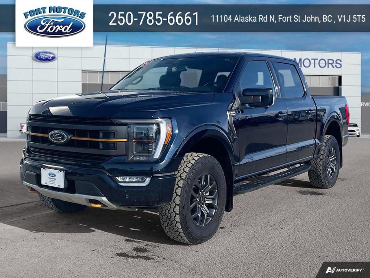 <p>This 2022 Ford F-150 4x4 Supercrew-145 is a head-turning pickup truck with a powerful presence.  Its Antimatter Blue Metallic exterior is accented by a black grille, black door handles, and black side window trim, giving it a sleek and sophisticated look.  The 3.5L V6 EcoBoost engine delivers impressive power and efficiency, while the 10-speed automatic transmission provides smooth and responsive shifting.  This F-150 is equipped with a comprehensive suite of features, including a powerful B&O Unleashed Sound System by Bang & Olufsen, a 400W outlet, and a wireless charging pad.  The Tremor Series package adds even more capability with its unique leather-trimmed bucket seats, 18" alloy wheels with a dark matte finish, and 275/70R18 all-terrain tires.</p>
<p>This F-150 is ready for any adventure, whether its hauling cargo, towing a trailer, or simply cruising down the highway.  With its impressive features, rugged capabilities, and stylish design, this truck is sure to turn heads wherever it goes.</p>
<p>Here are 5 of the most sizzling features of this F-150:</p>
<ol>
<li><strong>Tremor Series Package:</strong> This package adds a unique leather-trimmed bucket seats, 18" alloy wheels with a dark matte finish, and 275/70R18 all-terrain tires for a more rugged and capable look.</li>
<li><strong>B&O Unleashed Sound System by Bang & Olufsen:</strong>  Enjoy a premium audio experience with this 18-speaker system, including a subwoofer.</li>
<li><strong>400W Outlet:</strong>  Power up your devices with this convenient outlet, perfect for powering tools, electronics, or even a small refrigerator.</li>
<li><strong>Wireless Charging Pad:</strong>  Keep your phone charged without the hassle of cords with this convenient wireless charging pad.</li>
<li><strong>Ford Co-Pilot360 Assist 2.0:</strong>  This advanced driver-assist system includes features like Evasive Steering Assist, Intelligent Adaptive Cruise Control, and Lane Centering, making your driving experience safer and more comfortable.</li>
</ol>
<p>This 2022 Ford F-150 4x4 Supercrew-145 is available at Fort Motors with only 37,650 KM on the odometer.  Contact us today to schedule a test drive and experience this incredible truck for yourself.</p>
<p><em>Powered by AutoIntelligence™ AI</em></p>
