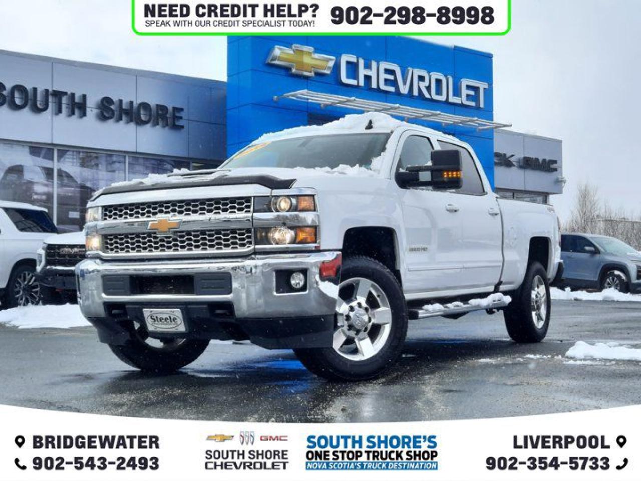 Recent Arrival! Summit White 2019 Chevrolet Silverado 2500HD LT For Sale, Bridgewater 4WD Allison 1000 6-Speed Automatic Duramax 6.6L V8 Turbodiesel Clean Car Fax, Allison 1000 6-Speed Automatic, 4WD, Black Cloth, 10-Way Power Drivers Seat Adjuster, 110-Volt AC Power Outlet, 6 Speakers, ABS brakes, Air Conditioning, Alloy wheels, Brake assist, Bumpers: chrome, CD player, Colour-Keyed Carpeting Floor Covering, Compass, Deep-Tinted Glass, Delay-off headlights, Driver door bin, Dual front side impact airbags, Dual-Zone Automatic Climate Control, Electric Rear-Window Defogger, Electronic Stability Control, Exterior Parking Camera Rear, Front anti-roll bar, Front Halogen Fog Lamps, Fully automatic headlights, Heated door mirrors, Illuminated entry, LT Convenience Package, Manual Tilt-Wheel/Telescoping Steering Column, Occupant sensing airbag, Outside temperature display, Overhead console, Panic alarm, Power door mirrors, Power steering, Power windows, Rear step bumper, Rear Wheelhouse Liners, Remote Keyless Entry, Remote Vehicle Starter System, Single Slot CD/MP3 Player, Speed control, Split folding rear seat, Standard Suspension Package, Steering Wheel Audio Controls, Tachometer, Tilt steering wheel, Traction control, Trip computer, Unauthorized EntryTheft Deterrent System, Variably intermittent wipers, Voltmeter.