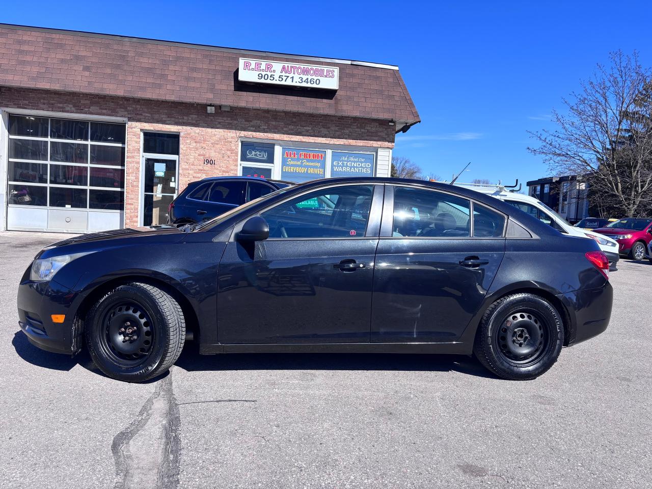 <p>Looking for a reliable and stylish sedan that wont break the bank? Look no further than this 2013 Chevrolet Cruze LS NON-TURBO XTRA CLEAN! from R.E.R. Automobiles Ltd. This sleek black beauty boasts a spacious grey interior and a powerful 1.8L 4-cylinder engine that delivers impressive fuel efficiency. With 179,060km on the odometer, this Cruze is ready for many more adventures.</p><p>Enjoy a comfortable and convenient ride with features like power windows, power door locks, and keyless entry. Stay connected on the road with Bluetooth connectivity and a premium sound system that will keep you entertained. And with safety features like anti-lock brakes, traction control, and multiple airbags, you can rest assured knowing you and your passengers are protected.</p><p>This 2013 Chevrolet Cruze LS NON-TURBO XTRA CLEAN! is the perfect combination of style, performance, and value. Stop by R.E.R. Automobiles Ltd. today for a test drive and experience the Cruze difference!</p><p><strong>Here are five of its most sizzling features:</strong></p><ul><li><strong>XTRA CLEAN!</strong> - This car has been meticulously cared for and is in excellent condition.</li><li><strong>Bluetooth Connectivity</strong> - Stay connected and hands-free while on the road.</li><li><strong>Premium Sound System</strong> - Enjoy your favorite tunes in high fidelity.</li><li><strong>Keyless Entry</strong> - Convenience at your fingertips, no need to fumble with keys.</li><li><strong>Warranty Available</strong> - Drive with peace of mind knowing your investment is protected.</li></ul><pre style=overflow-wrap: break-word; text-wrap-mode: wrap;>This vehicle is certified,  serviced & oil changed. Financing available O.A.C  <br /><br /><br />R.E.R. Automobiles Ltd. is a family owned business, established in 1994.<br /><br />Referrals built us, reliability keep us serving you.<br /><br />R.E.R. Automobiles Ltd. ... We Care.</pre>