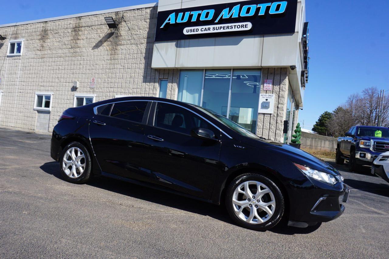 <div>*SAFETY INCLUDED*25 CHEVROLET SERVICE RECORDS*LOCAL ONTARIO CAR* <span>Very Clean Chevrolet Volt Hybrid 1.5L</span><span> With Automatic Transmission</span><span>. Black on </span><span>Black Leather</span><span> Interior, Fully Loaded with: Power Windows, Power Locks, and Power Mirrors, CD/AUX/USB, AC, Keyless Entry, Navigation System, Back Up Camera, Heated Leather front and back Seats, Push To Start, Fog Light, Cruise Control, Power Passenger Seat, Bluetooth, Front and Back Parking Sensors, and ALL THE POWER OPTIONS!! </span></div><br /><div><span>-------------------------------------------------</span><br><span>Financing options are available start from 6.96% with $0 Down payment O.A.C.</span><br><span>-------------------------------------------------</span><br><span>SAFETY CERTIFICATION INCLUDED*** Vehicle comes with: Safety Certification, and Car Fax Report ALL INCLUDED!! At no extra cost to you!! Dont miss this opportunity to own a high-quality, pre-owned vehicle. </span><br><span>-------------------------------------------------</span><br><span>Additionally, our vehicles qualify for up to 4 years of extended warranty. Please speak to your sales representative for more information.</span><br><span>-------------------------------------------------</span><br><span>We are open Monday to Saturday from 10am - 6pm, Sundays Closed.</span><br><span>-------------------------------------------------</span><br><span>We also welcome trade-ins, with on-site buyers available to estimate your vehicle on the same day.</span><br><span>-------------------------------------------------</span><br><span>Visit us at 3219 Harvester Road, Burlington, L7N 3N8 or call us at Nine O Five-281-2255 for more information.</span><br><span>------------------------------------------------</span><br><span>Check our inventory at www automotoinc ca</span></div>