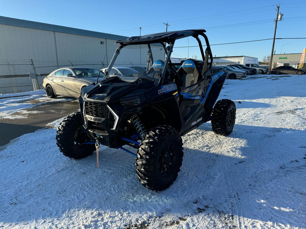 <p data-start=80 data-end=460>The 2022 Polaris RZR XP 1000 Ultimate is built for riders who demand top-tier performance, durability, and precision control on the toughest trails. Powered by a 999cc ProStar engine producing 110 horsepower, this high-performance side-by-side delivers exhilarating acceleration and the capability to dominate any terrain, from rocky climbs to wide-open desert runs.</p><p data-start=80 data-end=460> </p><p data-start=462 data-end=813>Designed for superior handling, the RZR XP 1000 Ultimate features Walker Evans Needle shocks with 16 inches of front and 18 inches of rear travel, giving you the confidence to tackle rough terrain with ease. Its 14 inches of ground clearance and optimized suspension geometry ensure stability and comfort even in the harshest conditions.</p><p data-start=462 data-end=813> </p><p data-start=815 data-end=1169>This model comes fully equipped with 30-inch Maxxis Carnivore tires on 14-inch aluminum wheels, a reinforced chassis, and full doors for added protection. The premium cockpit includes a 7-inch RIDE COMMAND touchscreen, Rockford Fosgate audio system, and electronic power steering (EPS) for effortless control on every adventure.</p><p data-start=815 data-end=1169> </p><p data-start=0 data-end=310> </p><p data-start=1171 data-end=1400 data-is-last-node= data-is-only-node=>Whether youre navigating technical rock sections or pushing the limits on high-speed trails, the 2022 Polaris RZR XP 1000 Ultimate is built to perform. Contact us today for financing options and fast nationwide delivery!</p>