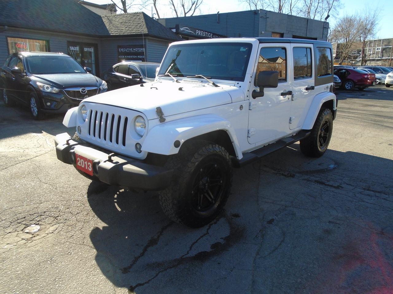 Used 2013 Jeep Wrangler SAHARA/ 6SPD / SOFT TOP / UPGRADED WHEELS / CLEAN/ for sale in Scarborough, ON