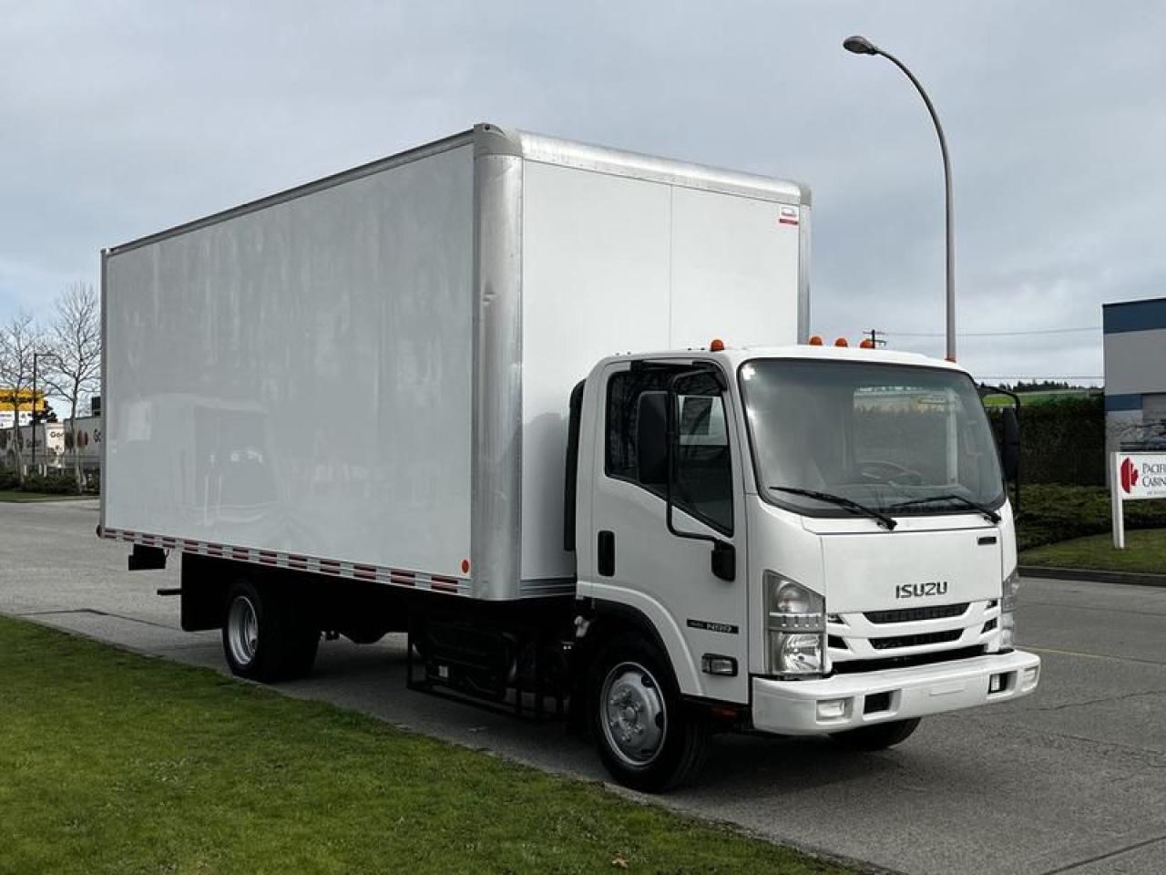 2019 Isuzu NQR 18 Foot Cube Van With Ramp Diesel, 5.2L, 4 cylinder, 2 door, automatic, 4X2, cruise control, air conditioning, AM/FM radio, power door locks, power windows, white exterior, grey interior, cloth. Certifiction and Decal valid until March 2026.

18 Foot Length

78 Width

8 Height  $59,870.00 plus $375 processing fee, $60,245.00 total payment obligation before taxes.  Listing report, warranty, contract commitment cancellation fee, financing available on approved credit (some limitations and exceptions may apply). All above specifications and information is considered to be accurate but is not guaranteed and no opinion or advice is given as to whether this item should be purchased. We do not allow test drives due to theft, fraud, acts of vandalism and undetectable impaired driving. Instead we provide the following benefits: Complimentary Warranty (with options to extend), Limited Money Back Satisfaction Guarantee on Fully Completed Contracts, Contract Commitment Cancellation, and an Open-Ended Sell-Back Option. Ask seller for details or call 604-522-REPO(7376) to confirm listing availability.