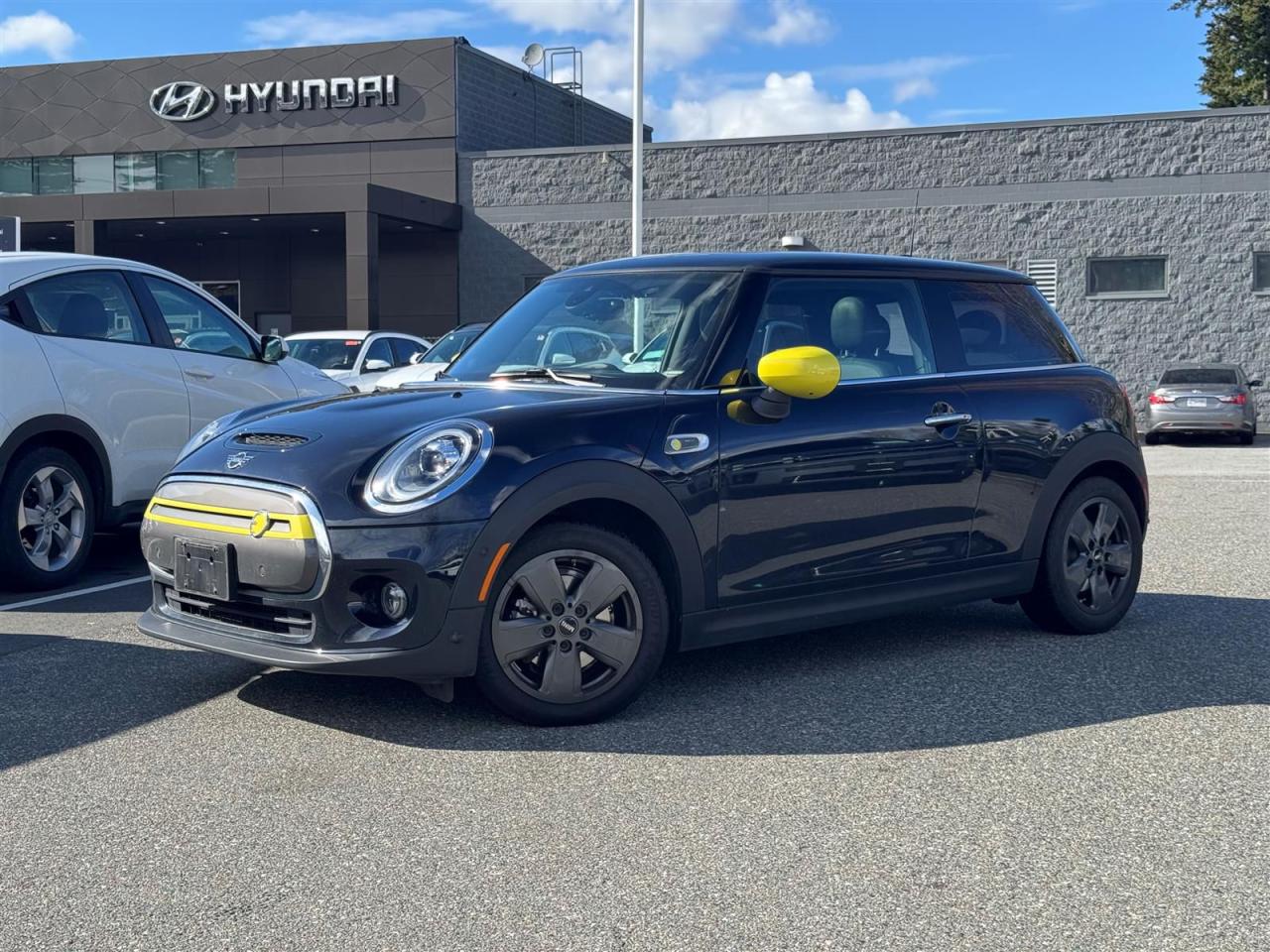 <br><br>Recent Arrival! 2021 MINI Cooper Black Electric Motor 1-Speed Automatic FWD<br><br><br>Why Buy From us? <br>*7x Hyundai Presidents Award of Merit Winner <br>*3x Consumer Choice Award for Business Excellence <br>*AutoTrader Dealer of the Year <br><br>M-Promise Certified Preowned ($995 value): <br>- 30-day/2,000 Km Exchange Program <br>- 3-day/300 Km Money Back Guarantee<br>- Comprehensive 144 Point Mechanical Inspection <br>- Full Synthetic Oil Change <br>- BC Verified CarFax <br>- Minimum 6 Month Power Train Warranty <br><br>Our vehicles are priced under market value to give our customers a hassle free experience. We factor in mechanical condition, kilometres, physical condition, and how quickly a particular car is selling in our market place to make sure our customers get a great deal up front and an outstanding car buying experience overall. At White Rock Hyundai, we help you get where you want to go. *All vehicle purchases are subject to a $599 administration fee. *Dealer #31129.<br><br><br>Odometer is 13928 kilometers below market average!<br><br>Awards:<br>  * ALG Canada Residual Value Awards<br><br>CALL NOW!! This vehicle will not make it to the weekend!!