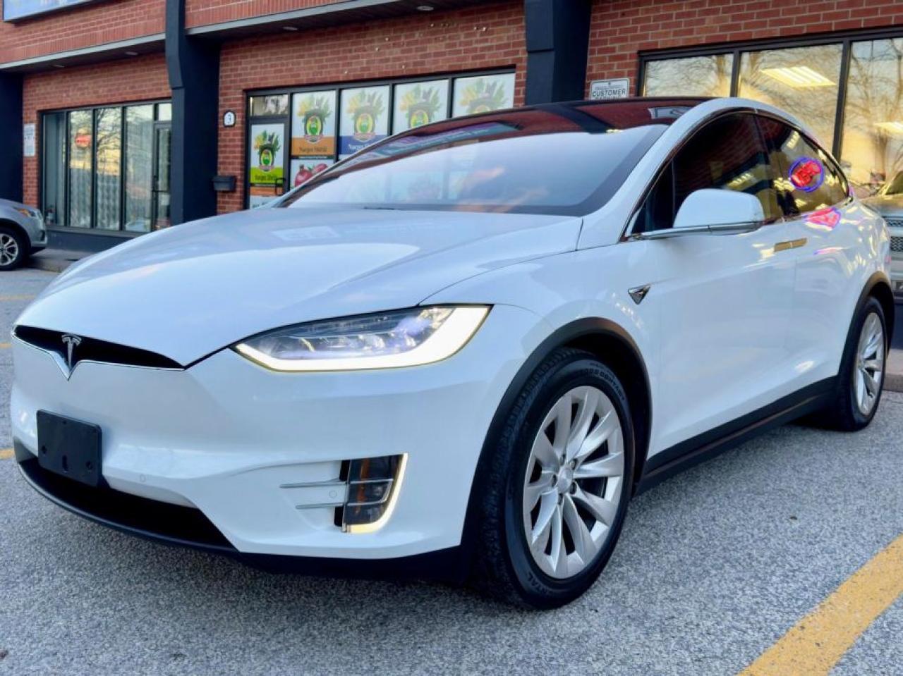 2016 TO 2024 AVAILBLE! LARGEST SELECTION OF MODEL XS / INDOOR SHOW ROOM! <br><br>Introducing the 2017 Tesla Model X     an all-electric SUV that perfectly combines advanced technology and impressive performance. With 328 horsepower and a 0-100 km/h time of around 6 seconds, the Model X offers smooth acceleration and remarkable efficiency. Featuring a sleek design, cutting-edge features, and a spacious interior, this vehicle delivers both luxury and performance in one powerful package.<br><br>-OPTIONS AND SPECS<br>-PEARL WHITE MULTI-COAT EXTERIOR<br>-BLACK INTERIOR <br>-HEATED SEATS <br>-AUTO PILOT <br>-ENHANCED AUTO PILOT ( INCLUDED )<br>-PREMIUM CONNECTIVITY ( INCLUDED ) <br>-AWD<br>-6 PASSENGER <br>-NAVIGATION<br>-AIR SUSPENSION<br>-FSD CAPABILITY<br>-POWER DOORS <br>-( MUCH MORE )<br><br><br>Every vehicle comes certified and Carfax verified at Auto Legends. With over 35 years of combined experience, our team has been around from the early days of manual windows to the rise of self-driving cars. <br><br><br>Auto Legends     Setting the pace to make your experience memorable and electrifying <br><br><br> AVAILABLE / INCLUDED OPTIONS<br>-FINANCING <br>-EXTENEDED PROTECTION PLANS <br>-TRADE INS <br>-CASH OR FINANCE     THE PRICE IS THE SAME FOR YOU<br>-SAFTEY INCLUDED <br>-CARFAX INCLUDED ON OUR WEBSITE<br>-PRICE PLUS TAXES AND LICENSING IS WHAT YOU PAY<br>-CERTIFIED PRE-OWNED VEHICLES<br><br><br>LOCATION<br>2150 STEELES AVE W<br>UNIT 1 &2<br>CONCORD, ON, L4K 2Y7<br><br><br>CONTACT FOR MORE INFORMATION @<br>I N F O @ A U T O L E G E N D S . C A<br>SALES:           6 4 7 - 9 3 0 - 8 1 8 0<br>FINANCING:  6 4 7 - 9 3 0 - 8 1 7 0 <br><br>