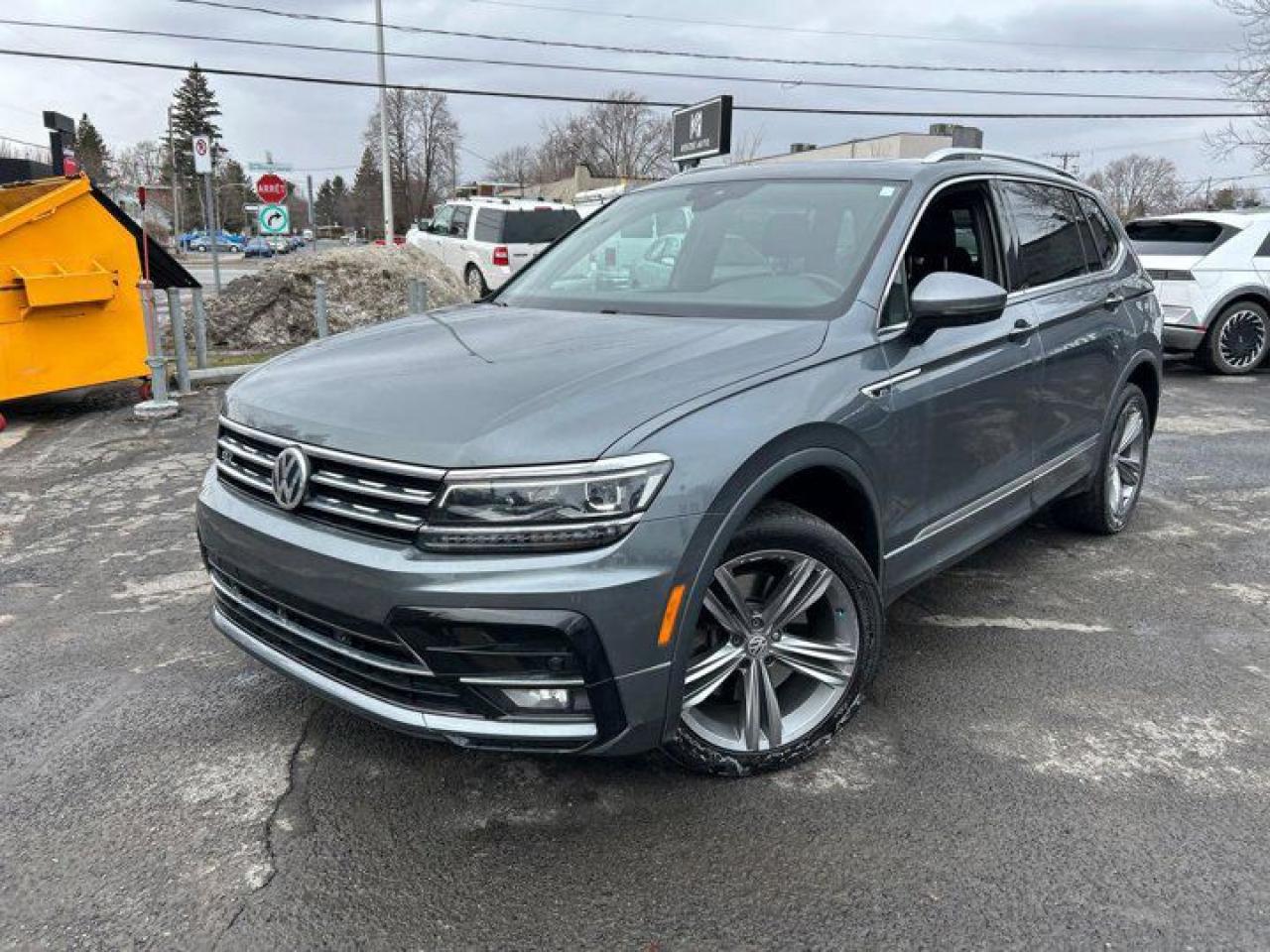 Come see this certified 2018 Volkswagen Tiguan Highline | 4Motion | Leather | Pano Roof | Nav | Heated Seats & Steering | Apple CarPlay | Android . Its Automatic transmission and 2.0 L engine will keep you going. This Volkswagen Tiguan has the following options: Reverse Camera, Remote Start, Panoramic Roof, Navigation System, Leather, Heated Steering Wheel, Air Conditioning, Heated Seats, Tilt Steering Wheel, and Steering Radio Controls. Stop by and visit us at Mark Wilsons Better Used Cars, 5055 Whitelaw Road, Guelph, ON N1H 6J4.60+ years of World Class Service!450+ Live Market Priced VEHICLES! ONE MASSIVE LOCATION!Free Local Delivery Available!FINANCING! - Better than bank rates! 6 Months No Payments available on approved credit OAC. Zero Down Available. We have expert licensed credit specialists to secure the best possible rate for you and keep you on budget ! We are your financing broker, let us do all the leg work on your behalf! Click the RED Apply for Financing button to the right to get started or drop in today!BAD CREDIT APPROVED HERE! - You dont need perfect credit to get a vehicle loan at Mark Wilsons Better Used Cars! We have a dedicated licensed team of credit rebuilding experts on hand to help you get the car of your dreams!WE LOVE TRADE-INS! - Top dollar trade-in values!SELL us your car even if you dont buy ours! HISTORY: Free Carfax report included.Certification included! No shady fees for safety!EXTENDED WARRANTY: Available30 DAY WARRANTY INCLUDED: 30 Days, or 3,000 km (mechanical items only). No Claim Limit (abuse not covered)5 Day Exchange Privilege! *(Some conditions apply)CASH PRICES SHOWN: Excluding HST and Licensing Fees.2019 - 2024 vehicles may be daily rentals. Please inquire with your Salesperson.