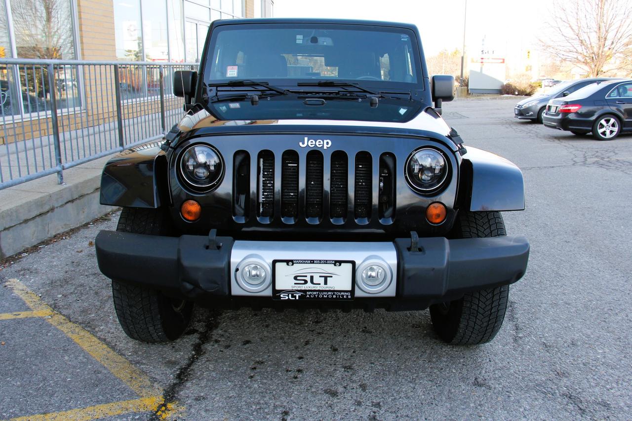 <p>2013 JEEP WRANGLER SAHARA UNLIMITED, BLACK WITH BLACK LEATHER INT, 2 TOPS, HARD TOP AND SOFT, BACK UP CAMERA, BLUE TOOTH, SIRUS RADIO, FULLY SERVICED, EXCELENT THROUGH OUT, CLEAN AND CERTIFIED! </p>