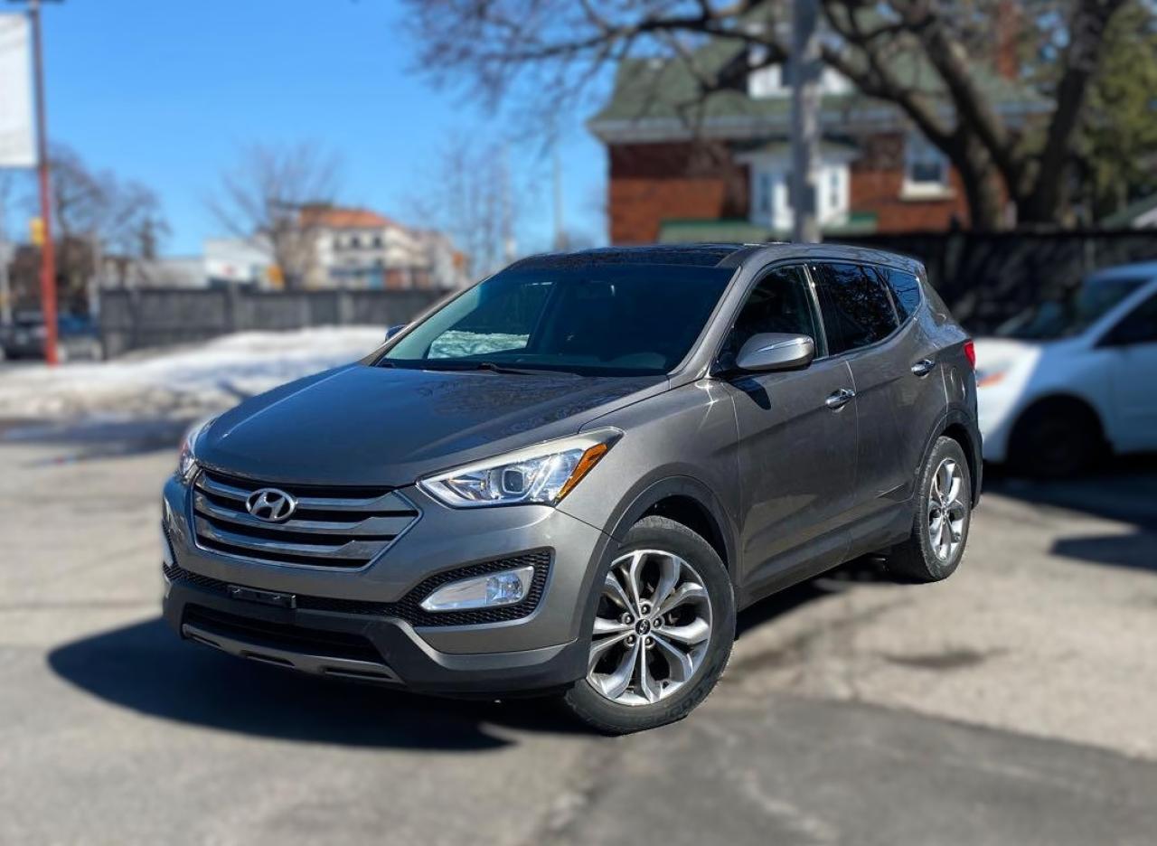 <p>Looking for a reliable and stylish SUV that combines performance, comfort, and versatility? Check out this 2013 Hyundai Santa Fe Sport 2.0 AWD! With its 2.0L turbocharged engine, smooth all-wheel drive system, and spacious interior, it’s perfect for both city driving and weekend adventures. The Santa Fe comes equipped with modern features like a touchscreen infotainment system, Bluetooth connectivity, and plenty of cargo space, making it an ideal choice for families or those who need a practical yet fun-to-drive vehicle. Dont miss out on this fantastic deal – come see it today and take it for a spin!</p><p>Finance Disclaimer: Finance pricing on this website is for website display purpose only. Please contact our office to confirm final pricing. Although the intention is to capture current prices as of the date of publication, pricing is subject to change without notice, and may not be accurate or completely current. While every reasonable effort is made to ensure the accuracy of this data, we are not responsible for any errors or omissions contained on these pages. Please verify any information in question with a dealership sales representative. Information provided at this site does not constitute a guarantee of available prices or financing rate. See dealer for actual prices, payment, and complete details. <br /><br />We invite you to see this vehicle at Presleys Auto Showcase on Carling Avenue just west of Island Park Drive. Call us today to book a test drive.TAXES AND LICENSE FEES ARE EXTRA.Ask us about our NO CHARGE limited Powertrain Warranty. This is for a limited time only. **Some conditions do apply.This vehicle will come with an Ontario Safety or Quebec Inspection.If you are looking to finance a car, Presleys Auto Showcase is your Ottawa, Ontario source for speedy online credit approval at the best car financing rates possible. Presleys Auto Showcase can pre-approve your car loan, even if your good credit rating has been compromised because of bad credit, low credit score, bankruptcy, repossession, collections or late payments. We also specialize in fast car loans for those who are retired, self employed, divorced, new immigrants or students. Let the knowledgeable and helpful auto loan specialists at Presleys Auto Showcase give you the personal touch.</p>